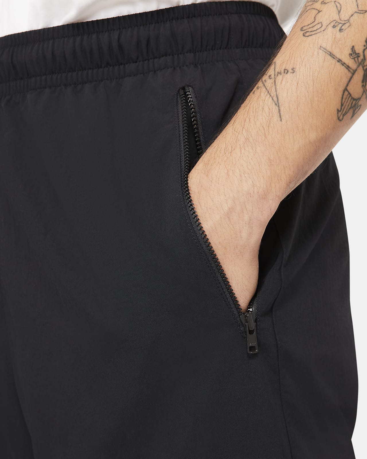 nike tracksuit bottoms with zips