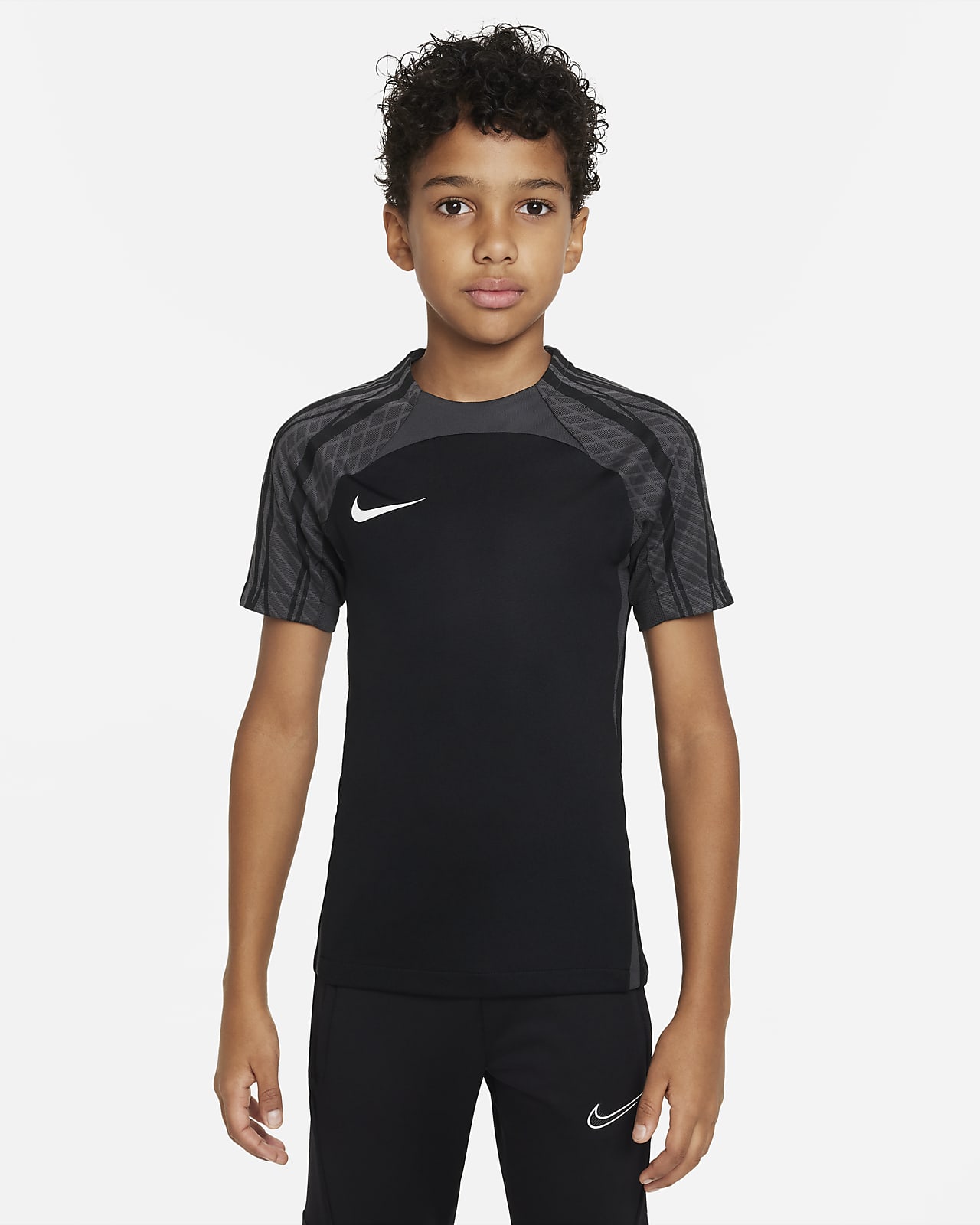 asustado Reparación posible Embajador Nike Dri-FIT Strike Older Kids' Short-Sleeve Football Top. Nike NO