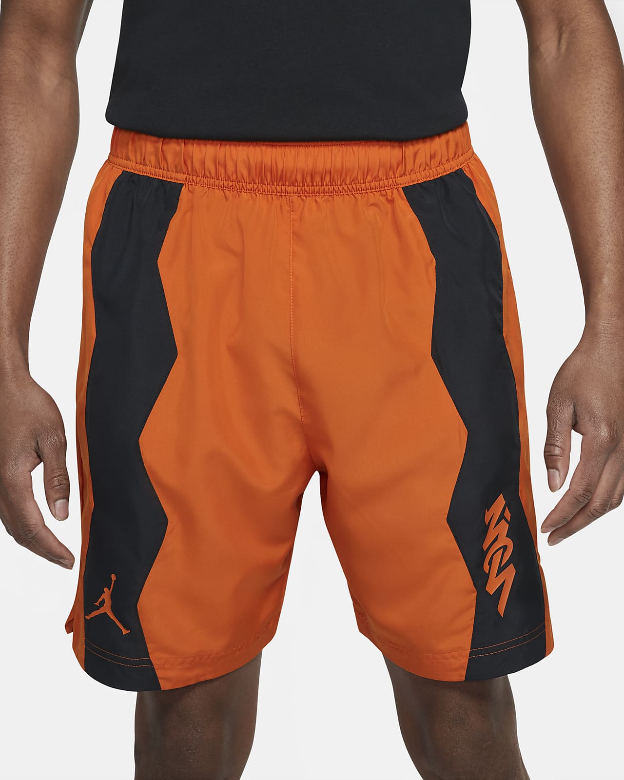black and orange shorts