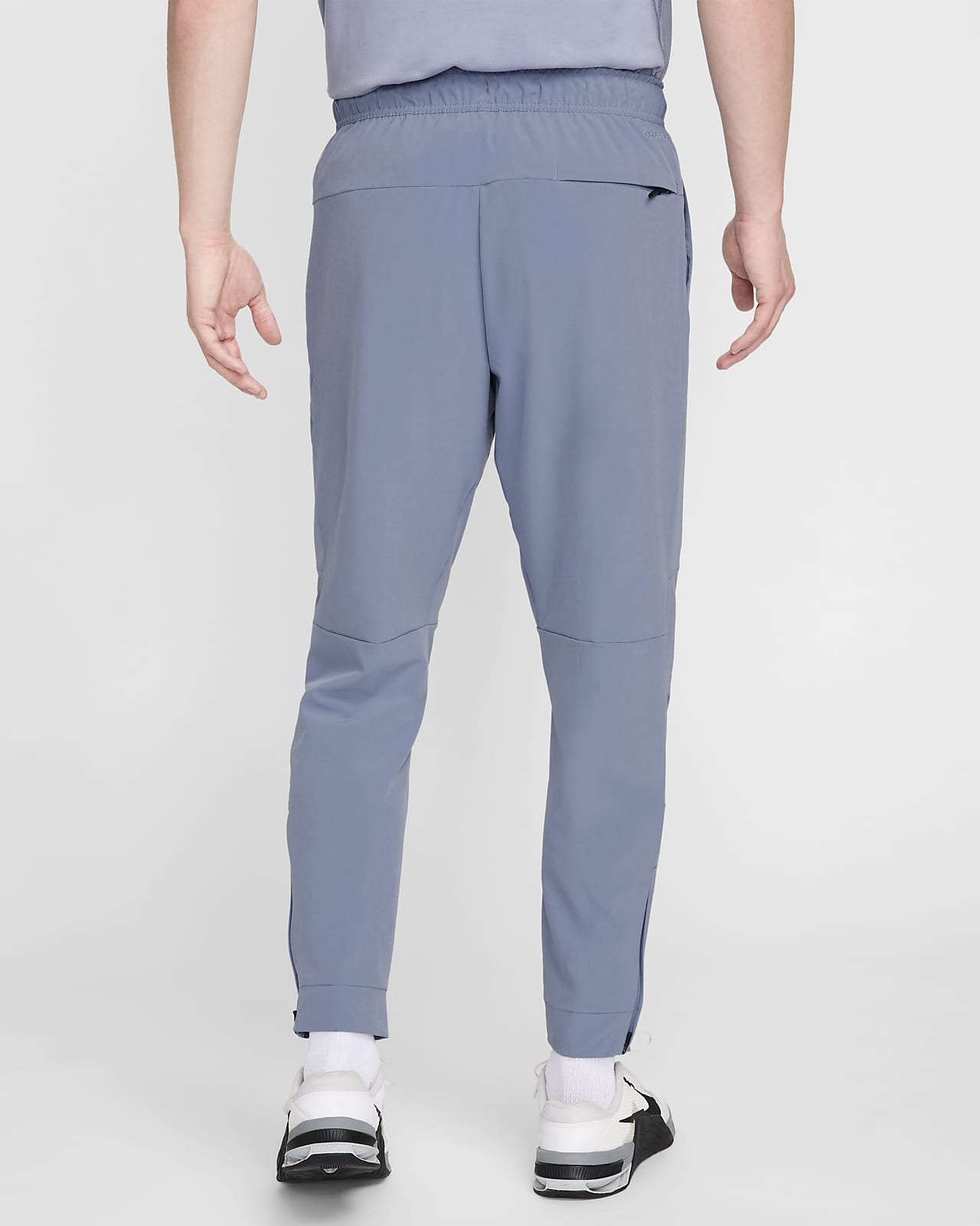 Nike Unlimited Men's Dri-FIT Zippered Cuff Versatile Pants.