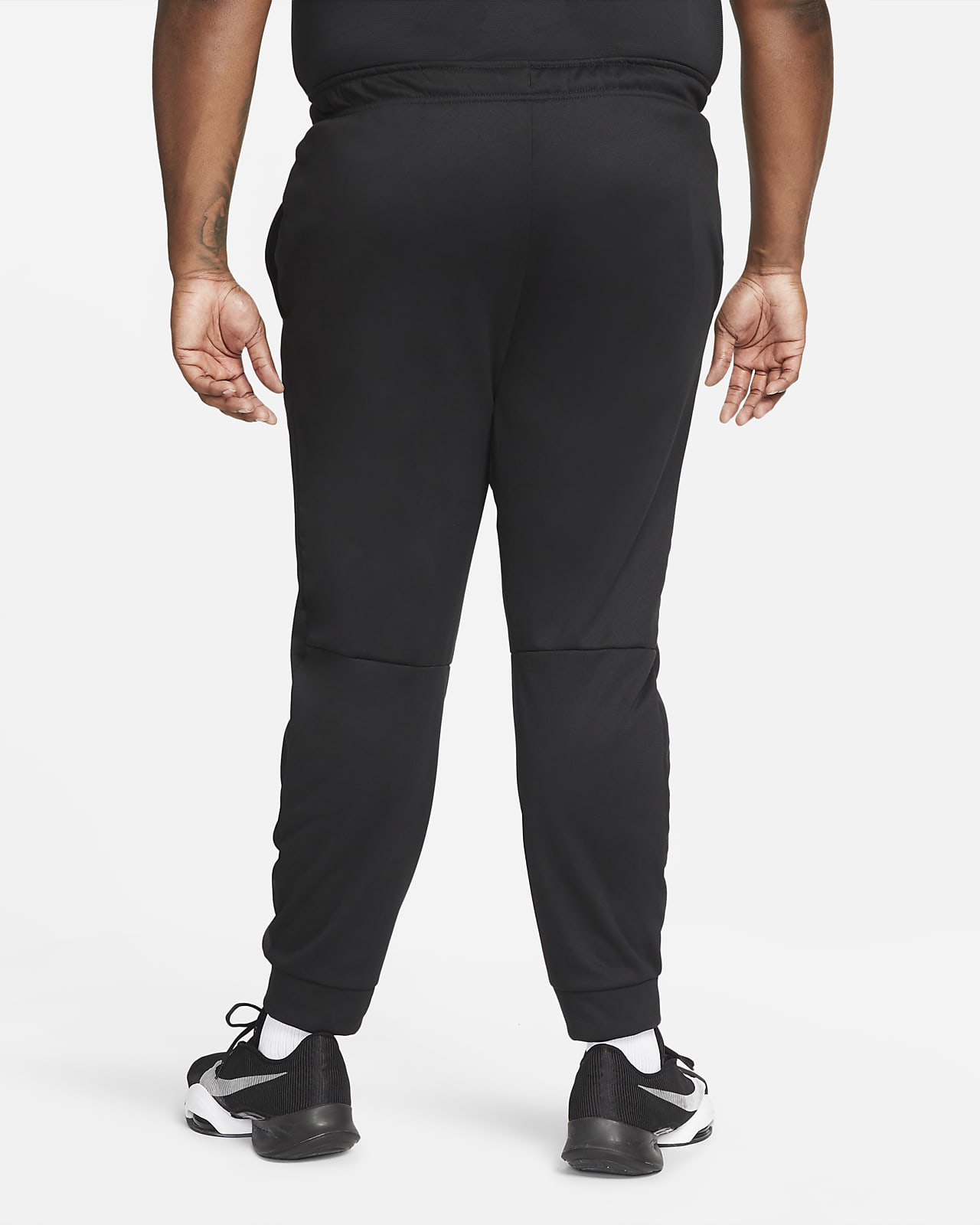 Men's tapered training 2025 trousers nike therma