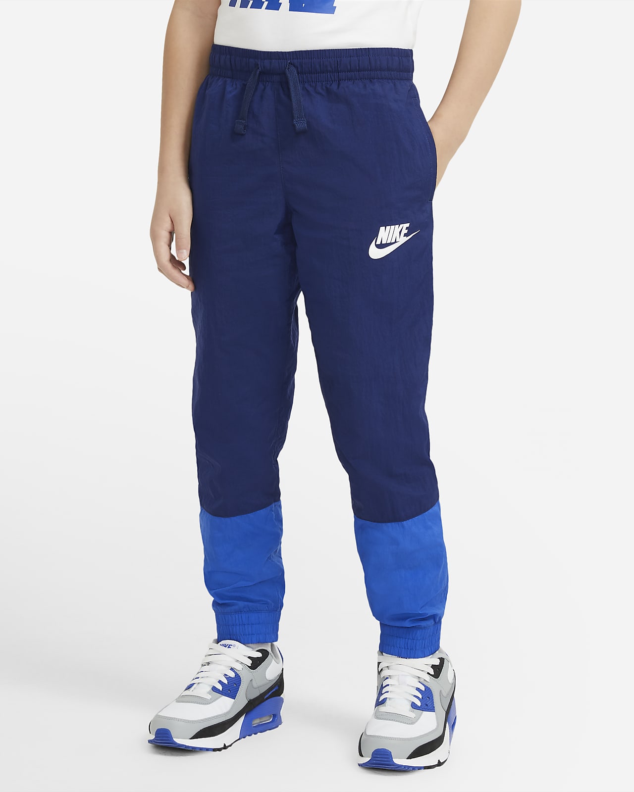 white and blue nike tracksuit