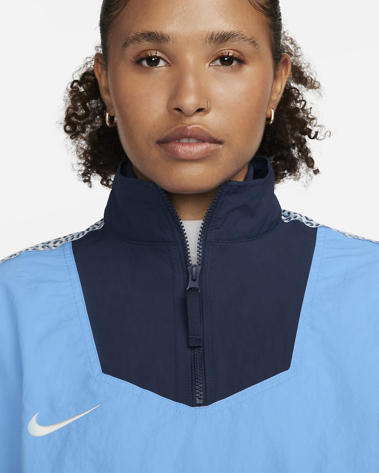 Nike Sportswear x Nike United Women\'s Oversized Woven Track Jacket.