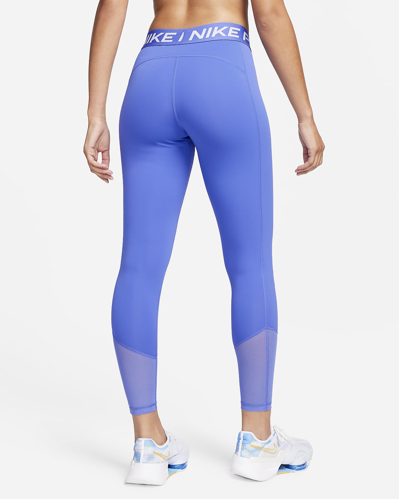 Nike Pro lange legging met halfhoge taille voor dames. Nike BE