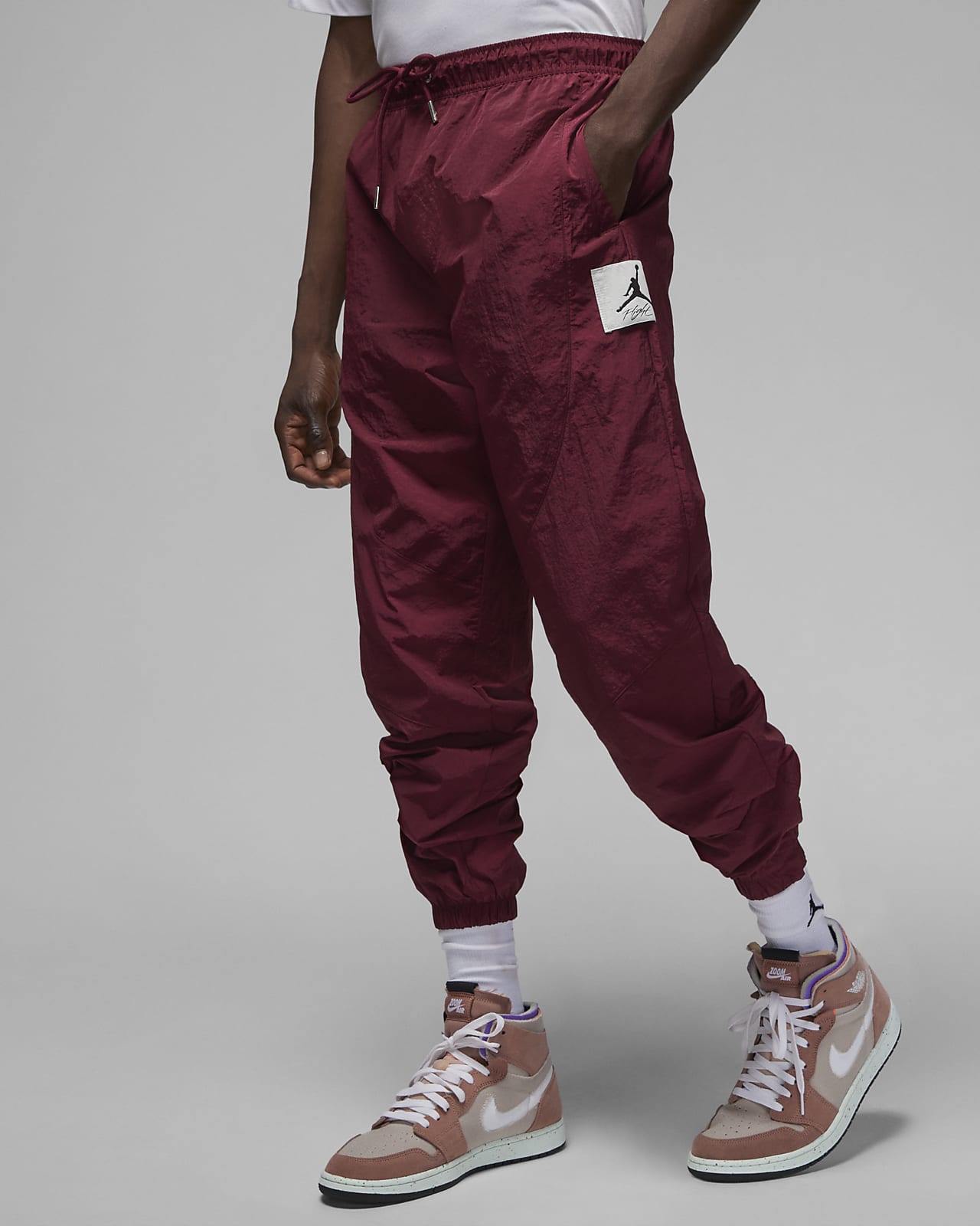 Jordan Essential Statement Warming-upbroek voor heren. Nike BE