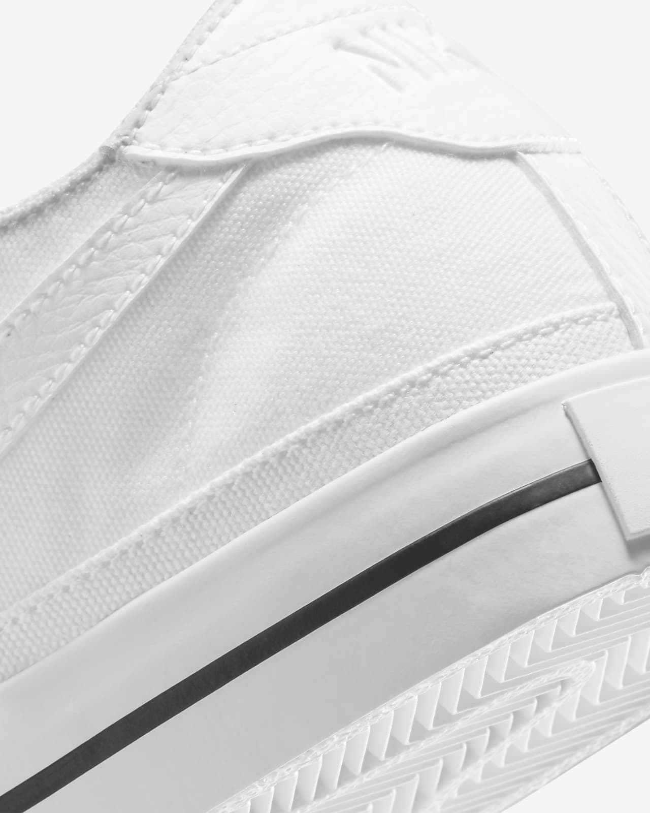 nike men's white canvas shoes