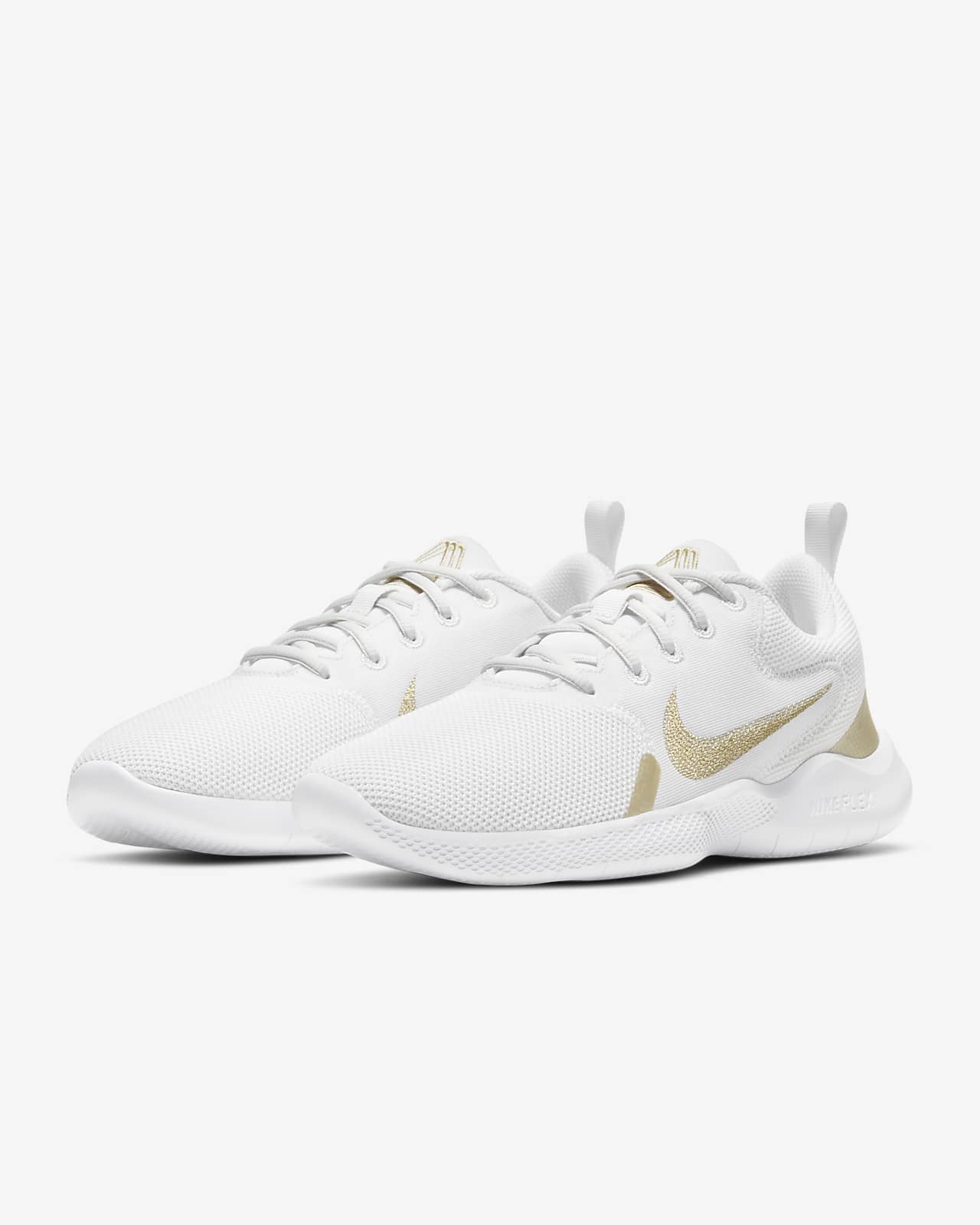white and gold nike running shoes
