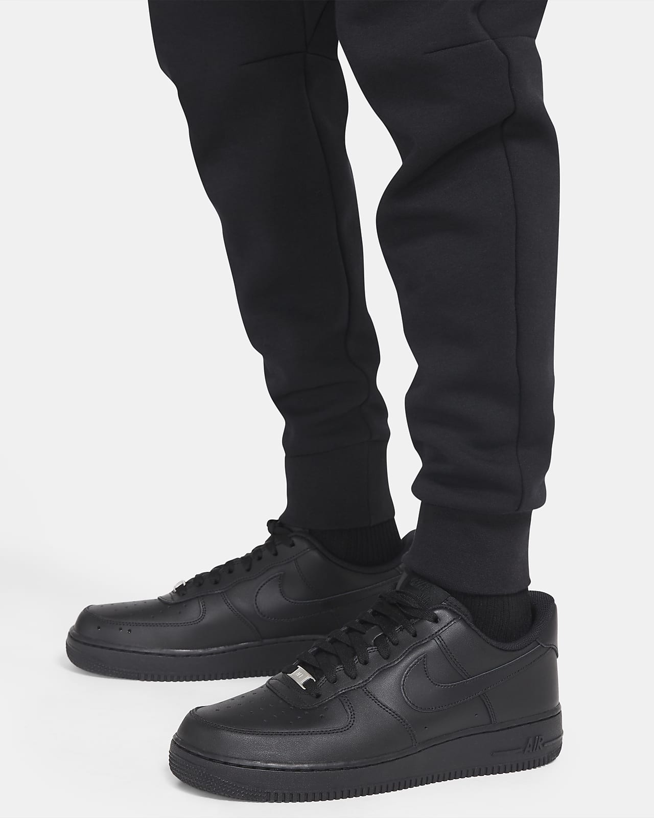nike tech woven joggers