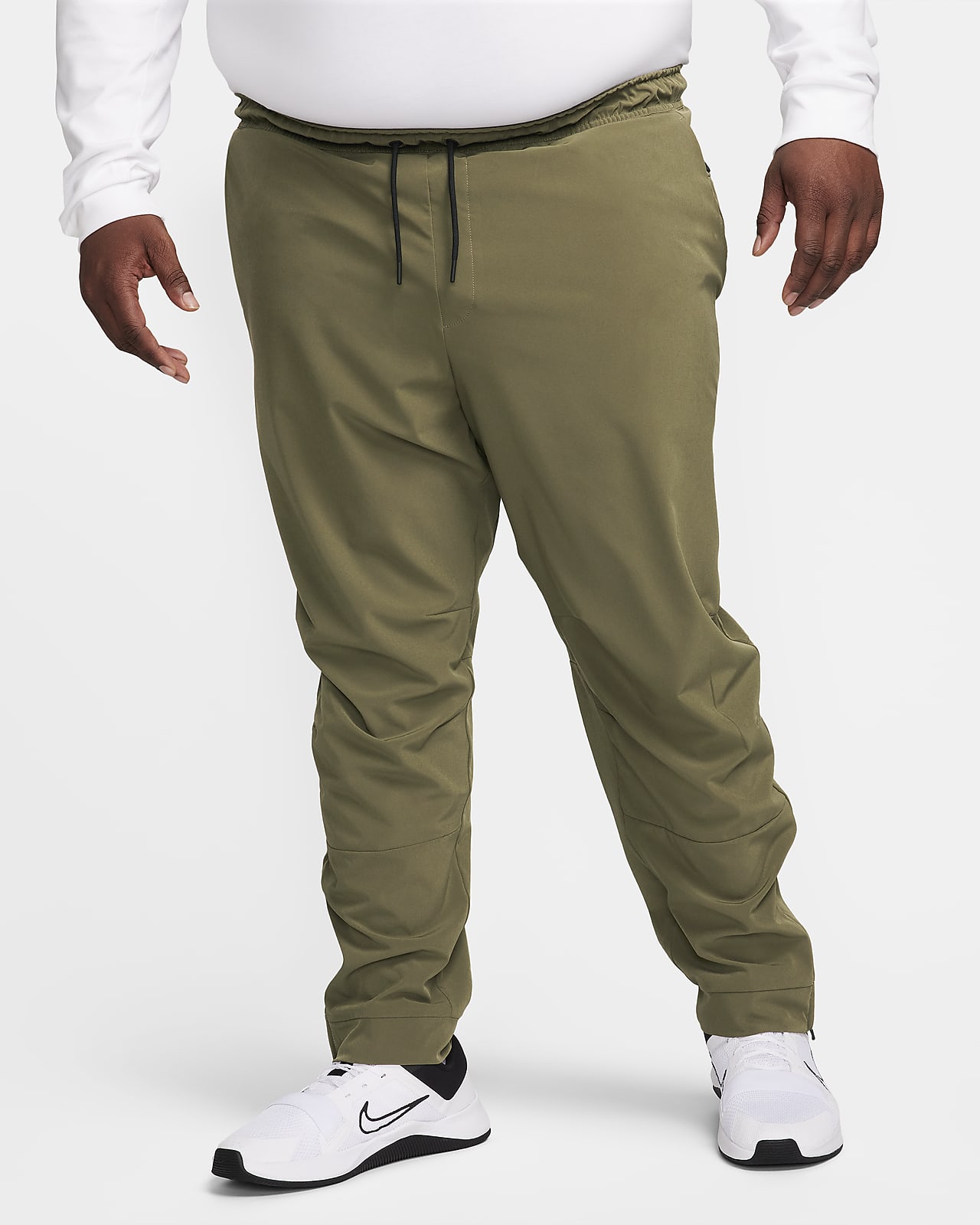 Nike Unlimited Men's Dri-FIT Zip Cuff Versatile Trousers. Nike LU