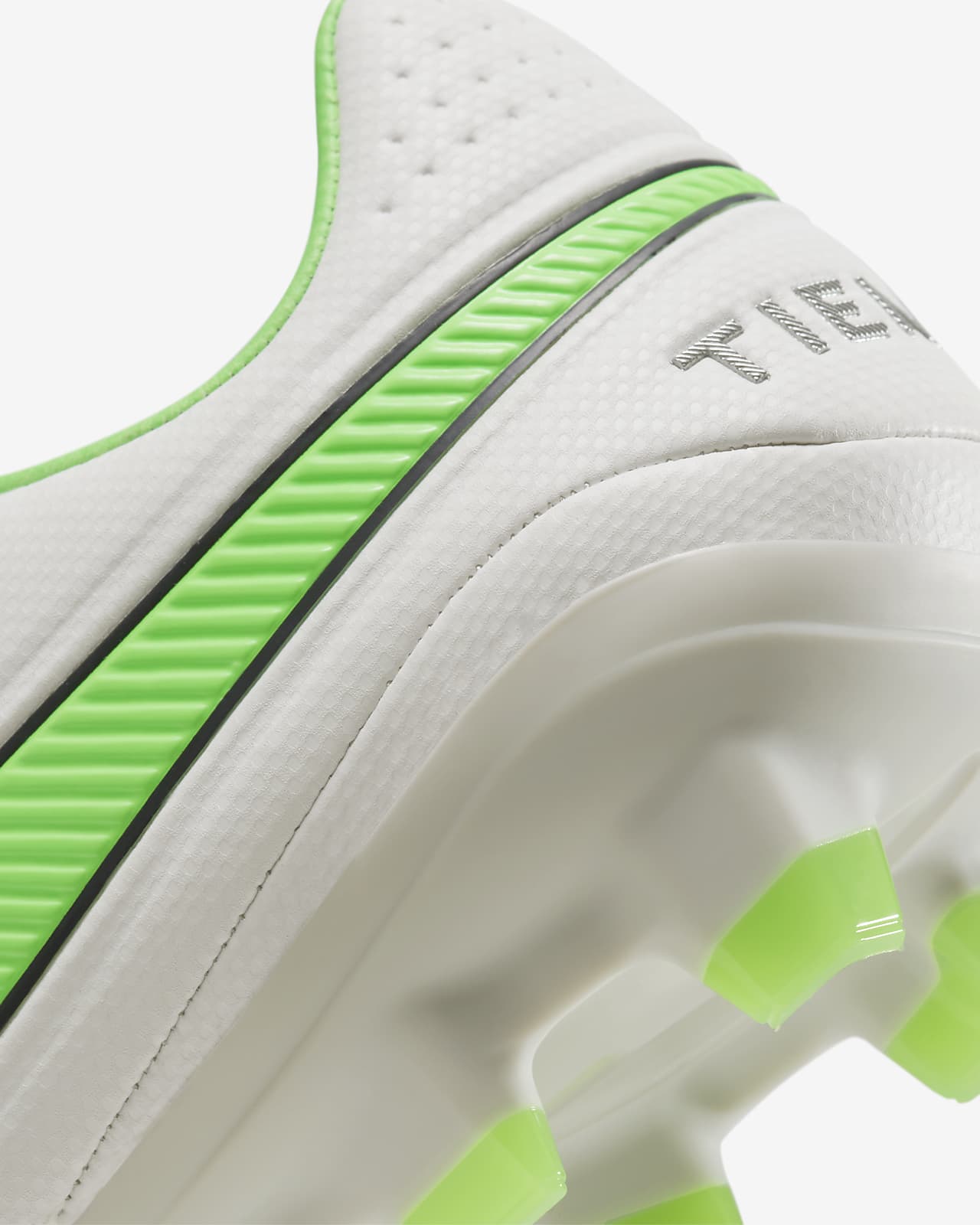 white and green nike soccer cleats