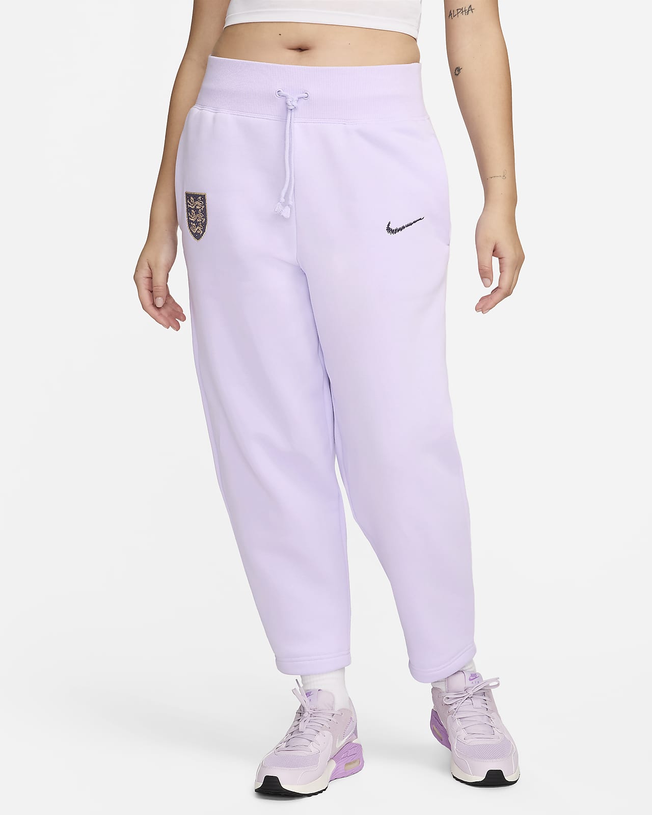Damskie spodnie piłkarskie Nike z wysokim stanem Anglia Phoenix Fleece (duże rozmiary)