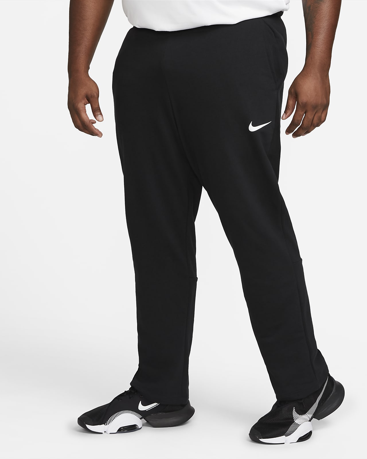 Dibuja una imagen representación Implacable Nike Dri-FIT Men's Training Pants. Nike.com