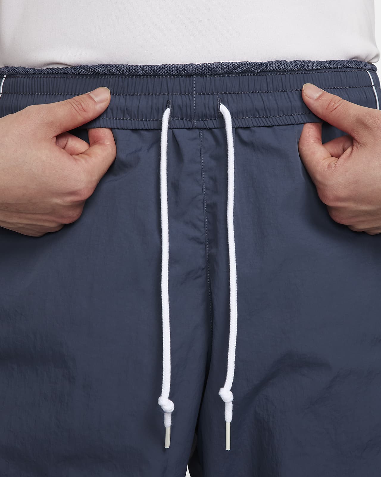 Nike track best sale pants zipper pockets