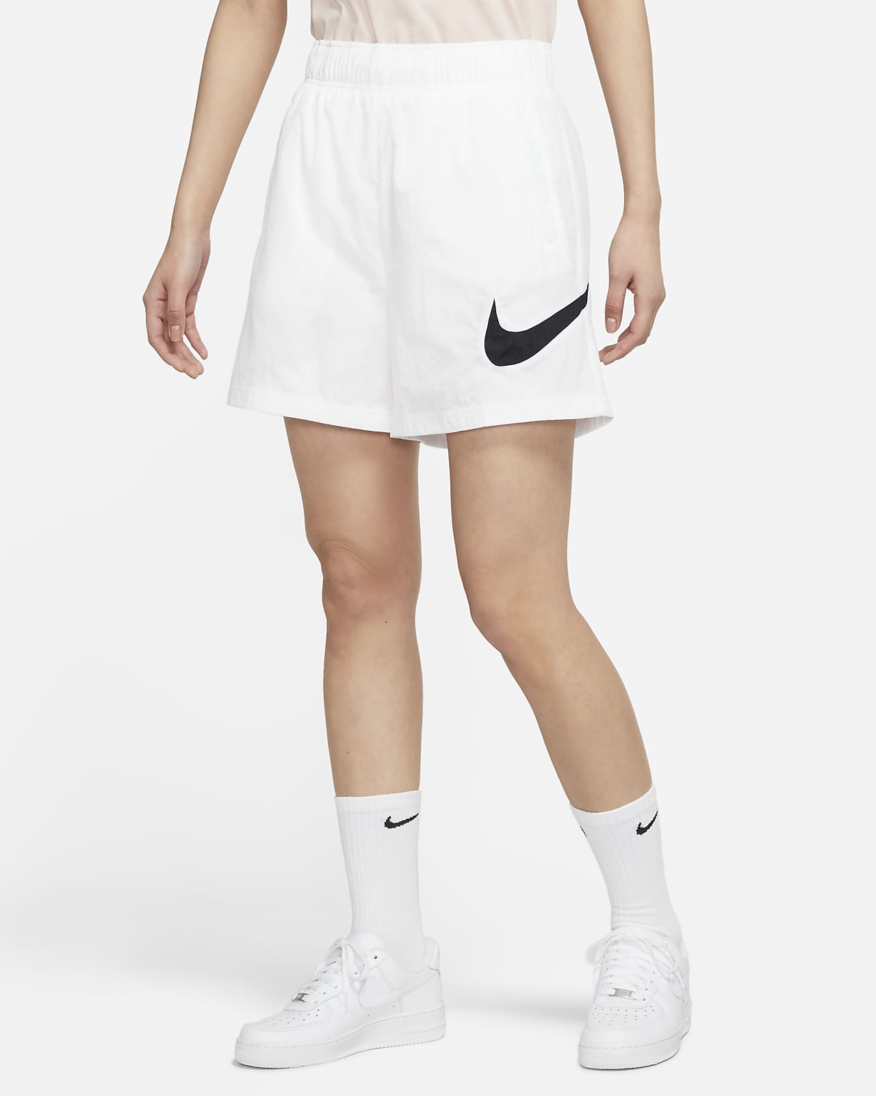กางเกงขาสั้นเอวสูงแบบทอผู้หญิง Nike Sportswear Essential