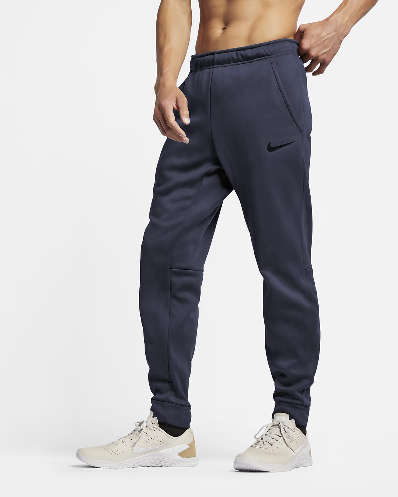 Nike Therma-FIT Men's Tapered Training Trousers. Nike HU