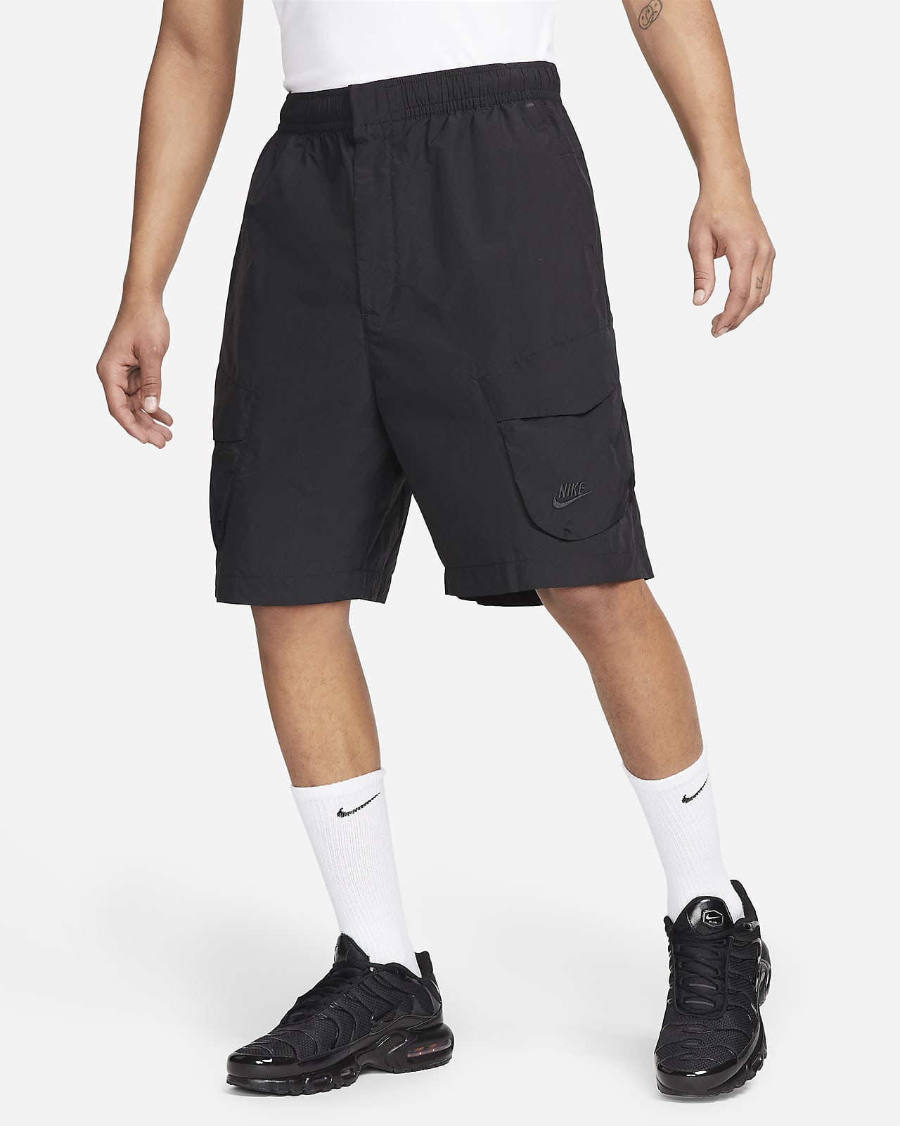 Shorts utility in tessuto non foderati Nike Sportswear Tech Essentials -  Uomo. Nike CH