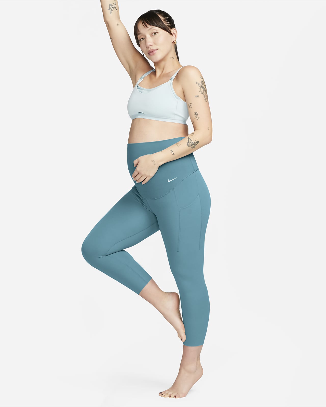 Damskie ciążowe legginsy 7/8 z wysokim stanem i kieszeniami zapewniające  delikatne wsparcie Nike Zenvy (M)