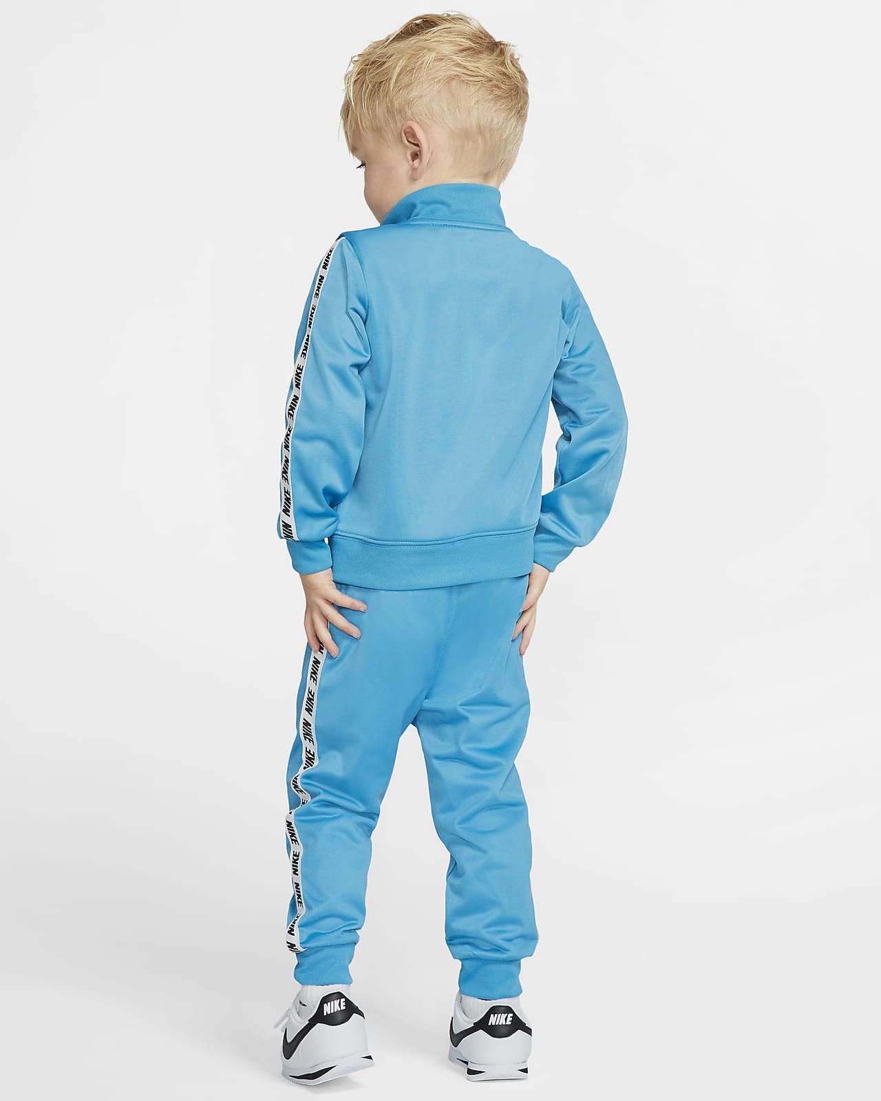 turquoise nike tracksuit