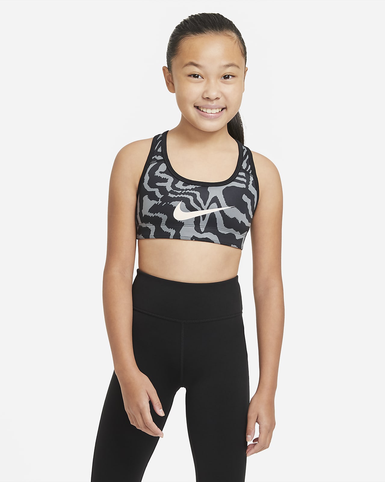 Nike Swoosh Older Kids' (Girls') Reversible Printed Sports Bra. Nike EG