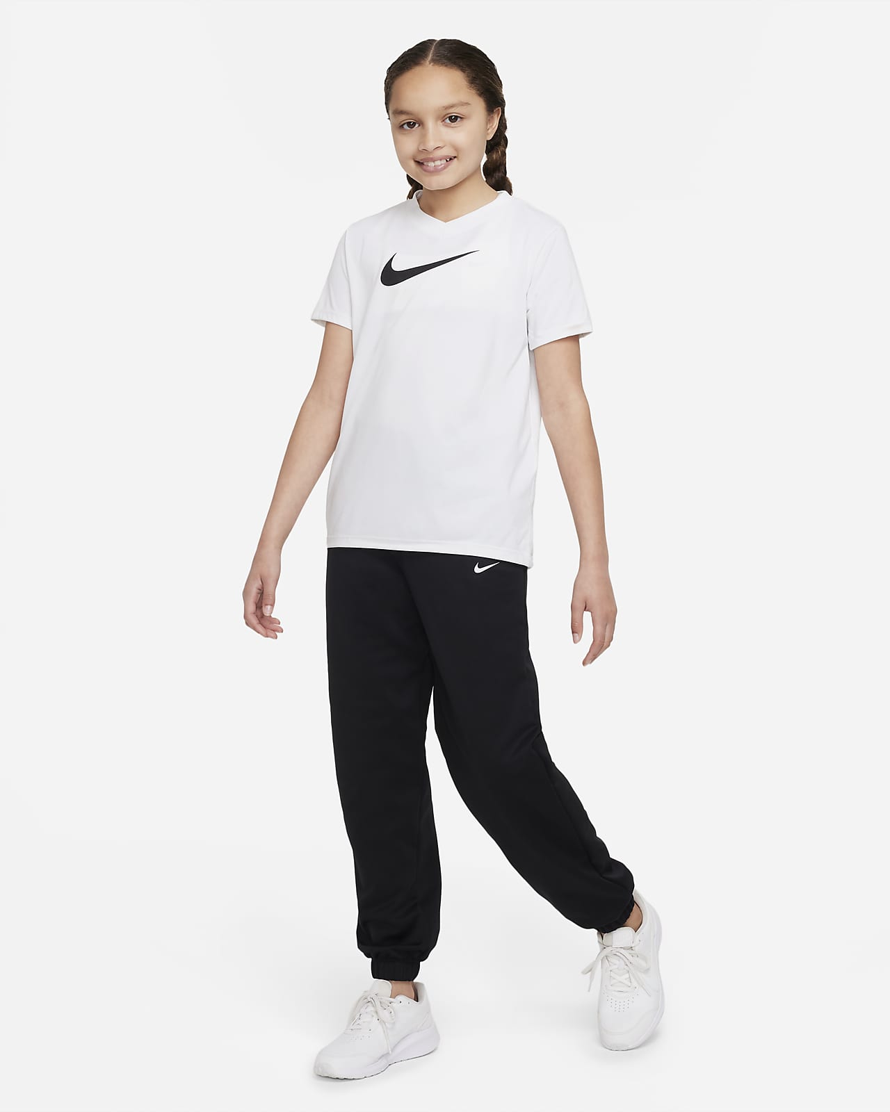 Nike Therma-FIT Older Kids' (Girls') Cuffed Trousers. Nike AE