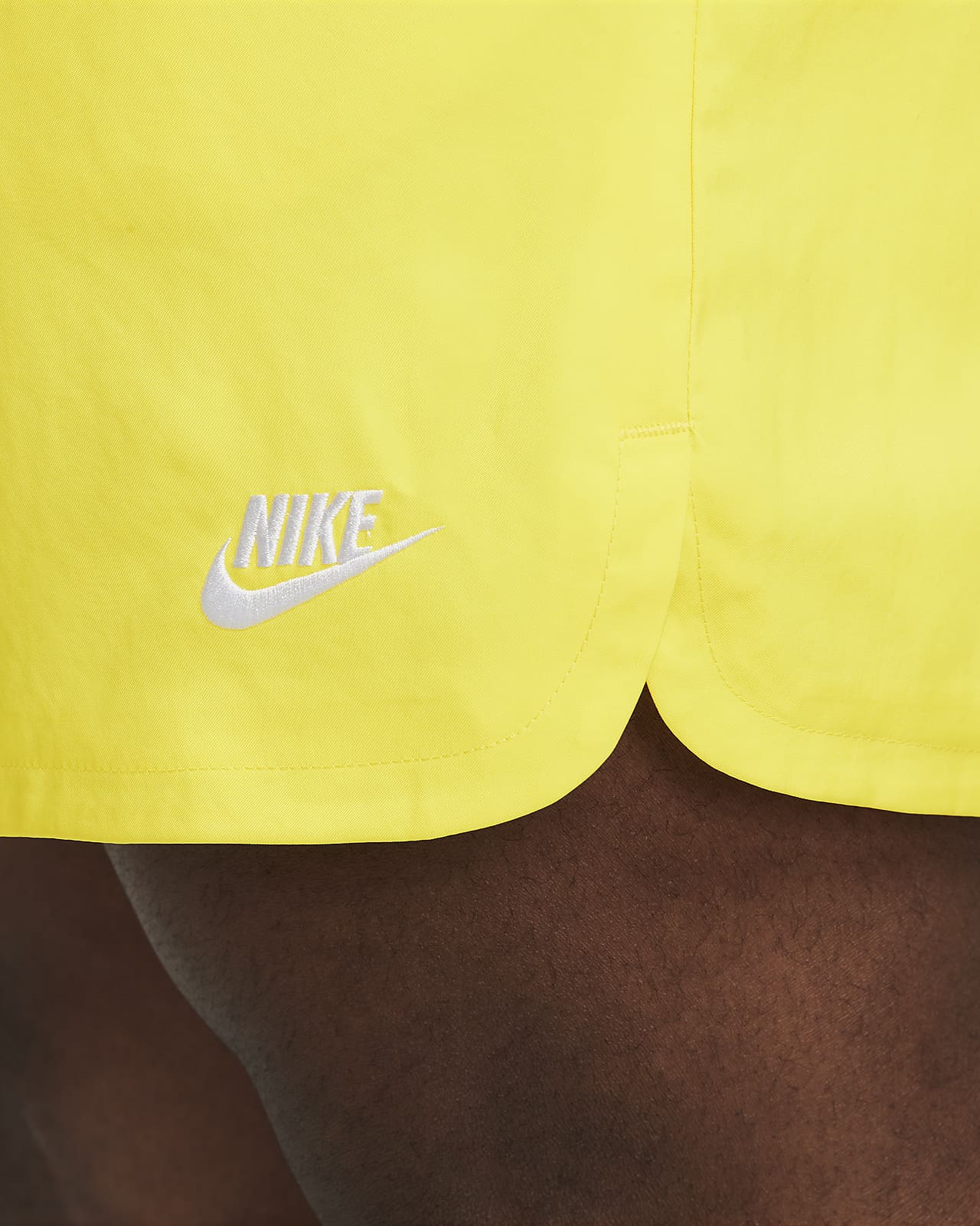 Nike club essentials woven flow 2025 shorts yellow