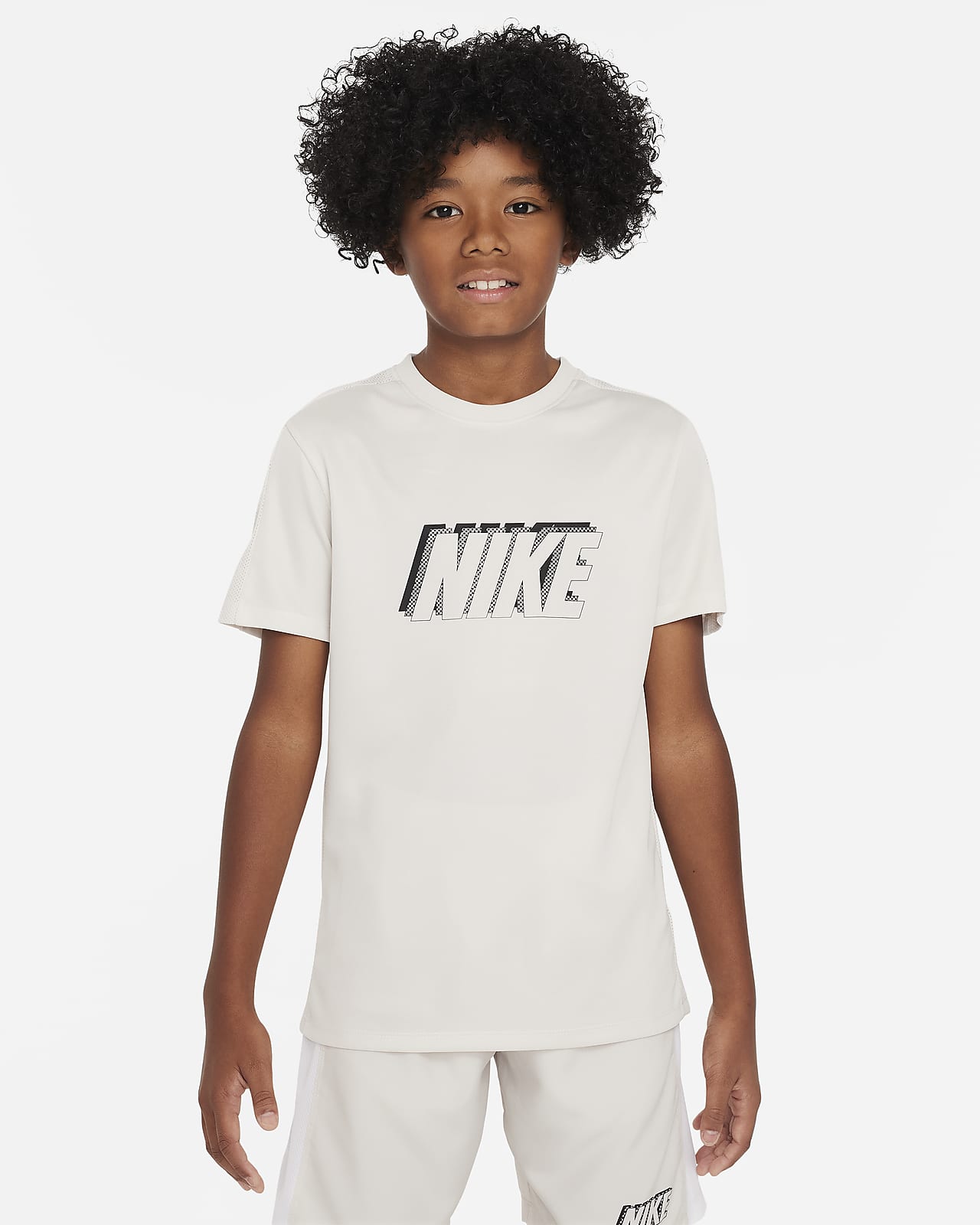 Nike Dri-FIT Academy23 Older Kids' Short-Sleeve Football Top. Nike PT