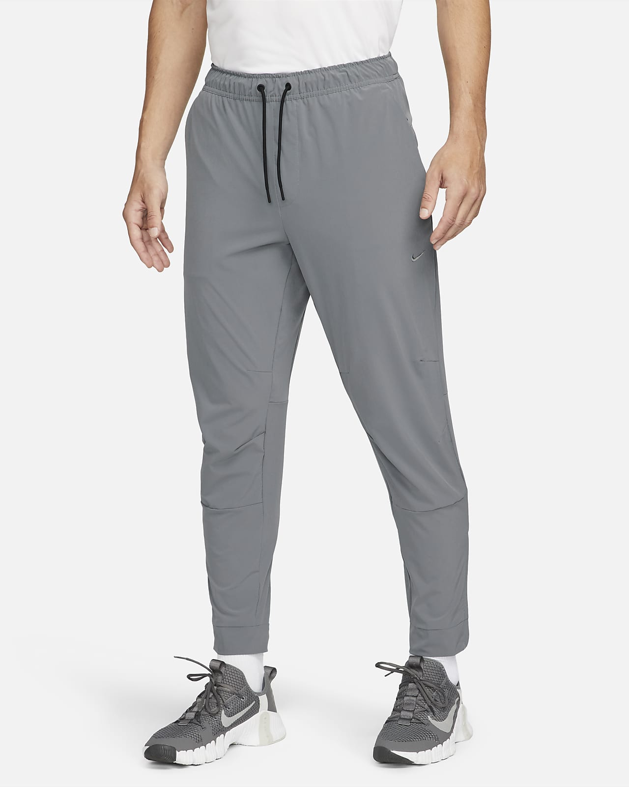 Nike Unlimited Dri-FIT allsidig bukse med glidelås ved ankelen til herre