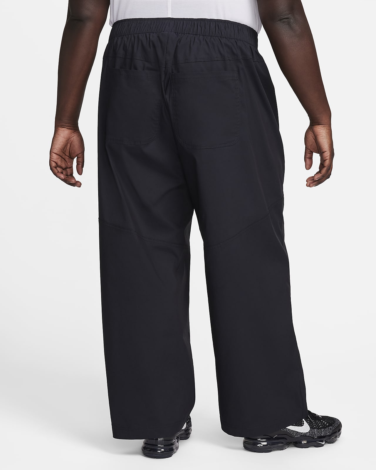 Nike Sportswear Essential Women's Woven High-Waisted Trousers (Plus Size).  Nike LU