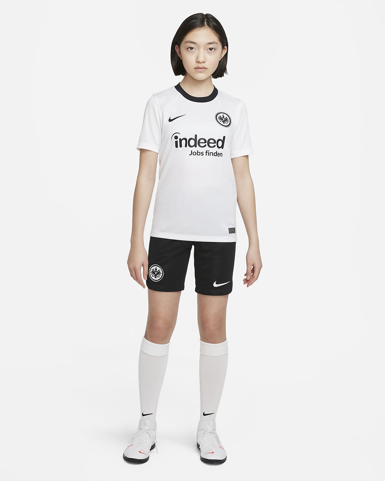 Eintracht Frankfurt 2022/23 Home Older Kids' Nike Dri-FIT Short-Sleeve Top. Nike LU