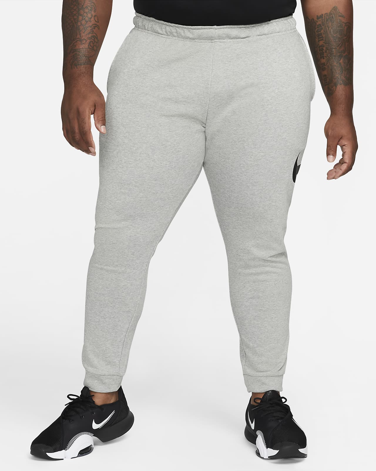 Nike Sportswear Tapered Pants in Mottled Black
