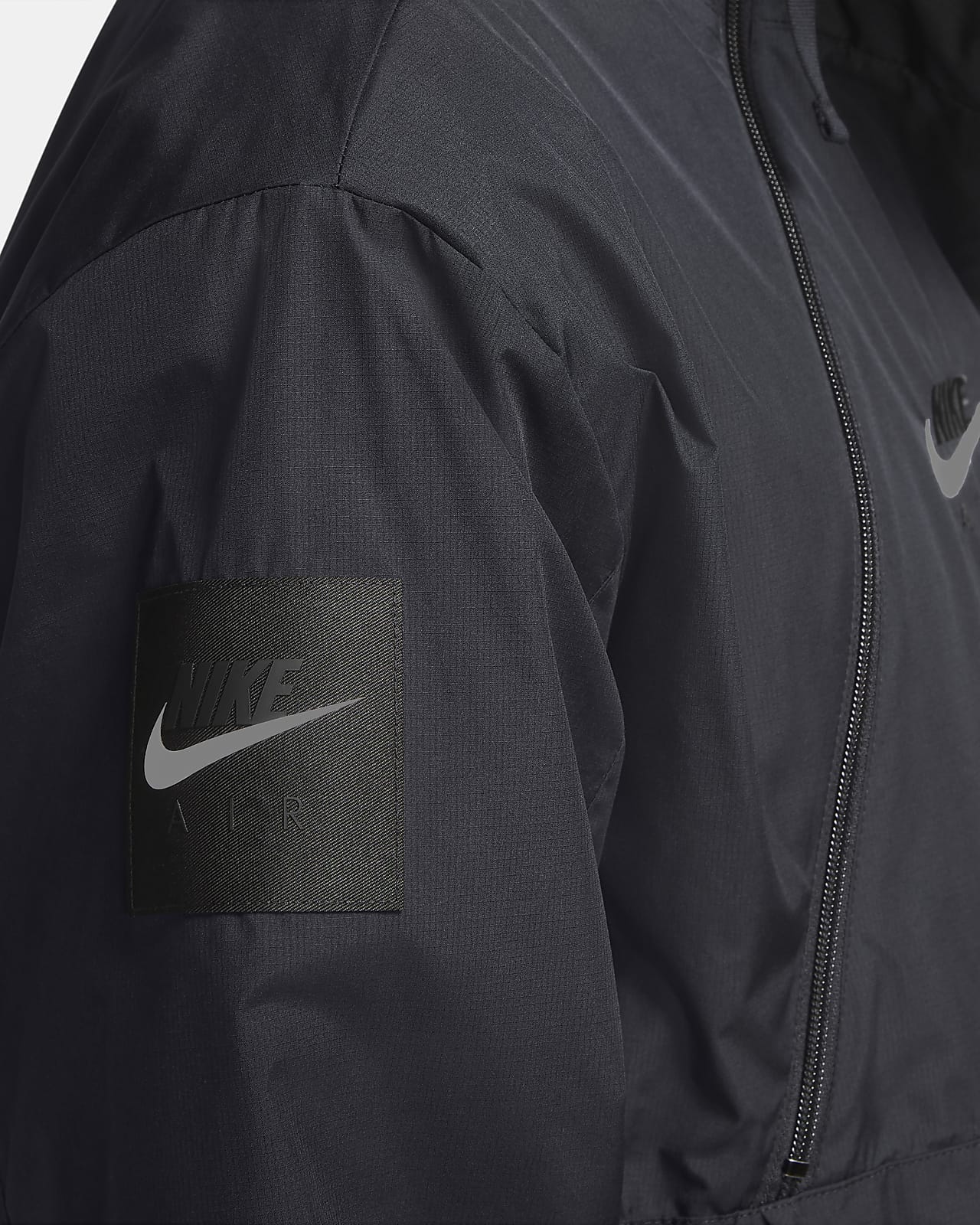 black white and gray nike windbreaker