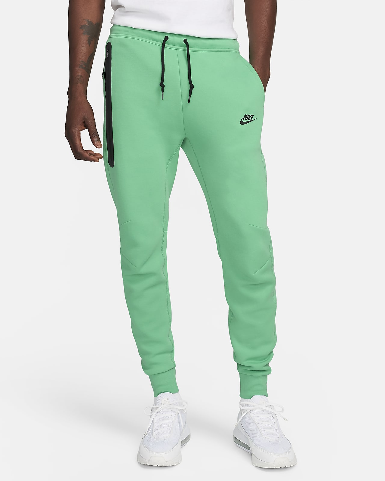 Nike Sweatpants PHOENIX FLEECE in light green
