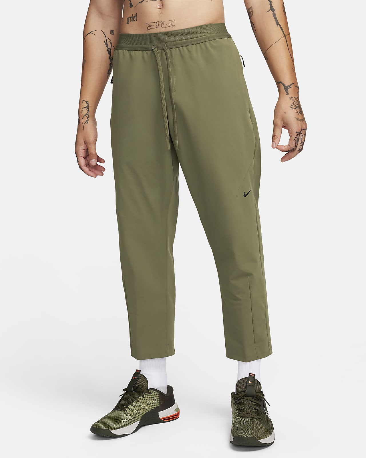 Nike A.P.S. Men's Dri-FIT Woven Versatile Pants.