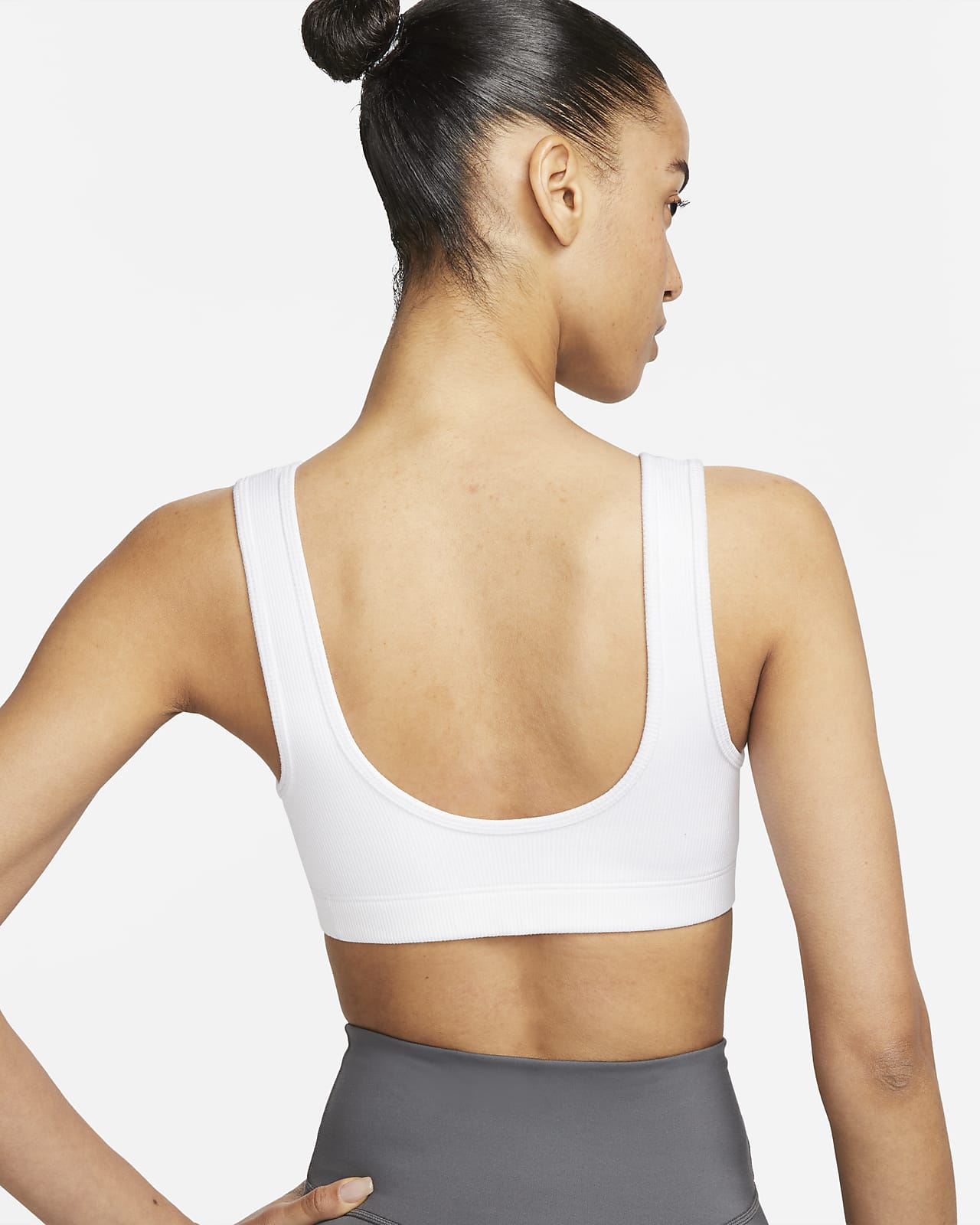 Nike Yoga Indy Women's Light-Support Lightly Lined Ribbed Sports Bra. Nike  PT