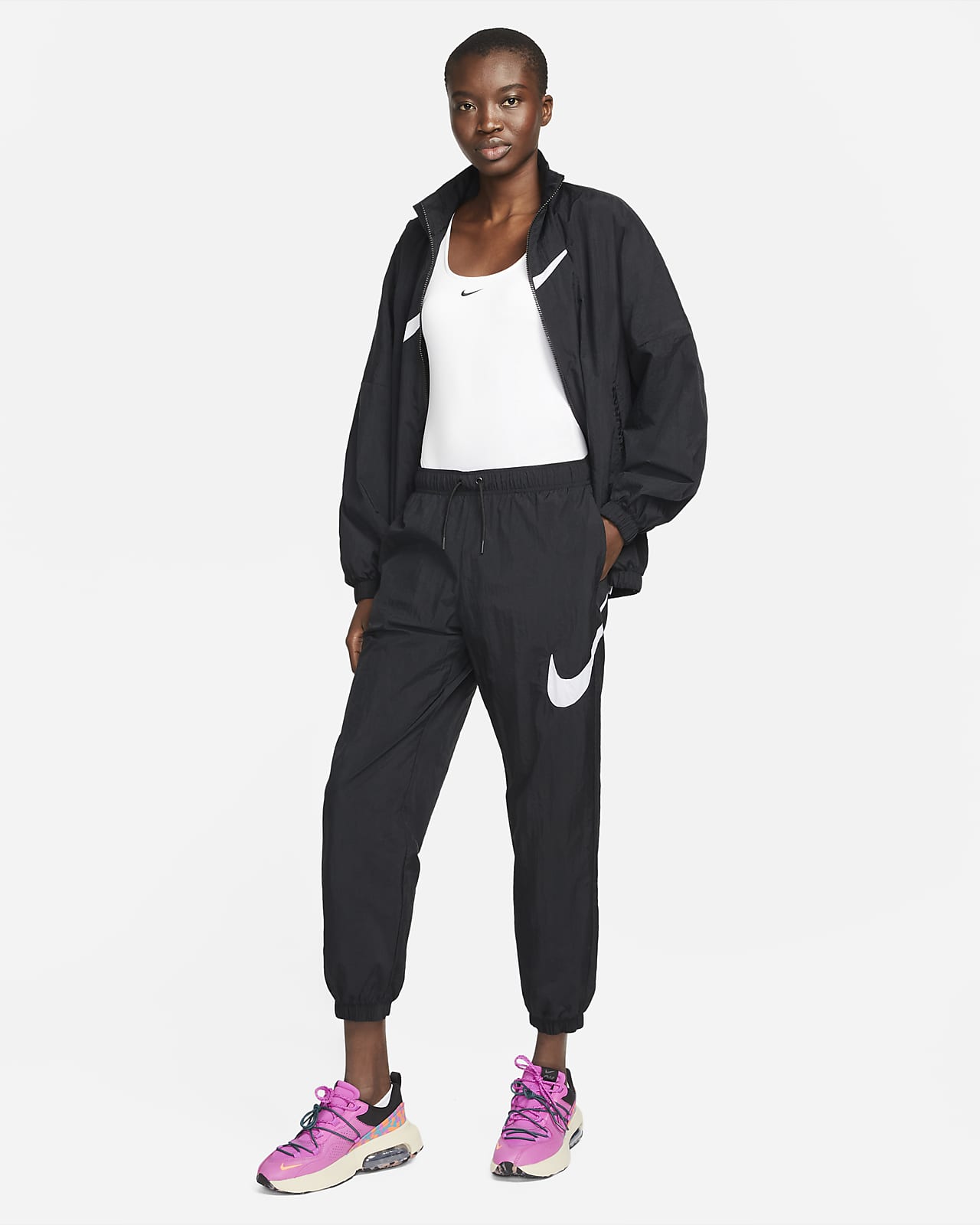 Pantaloni a vita media Nike Sportswear Essential - Donna. Nike IT