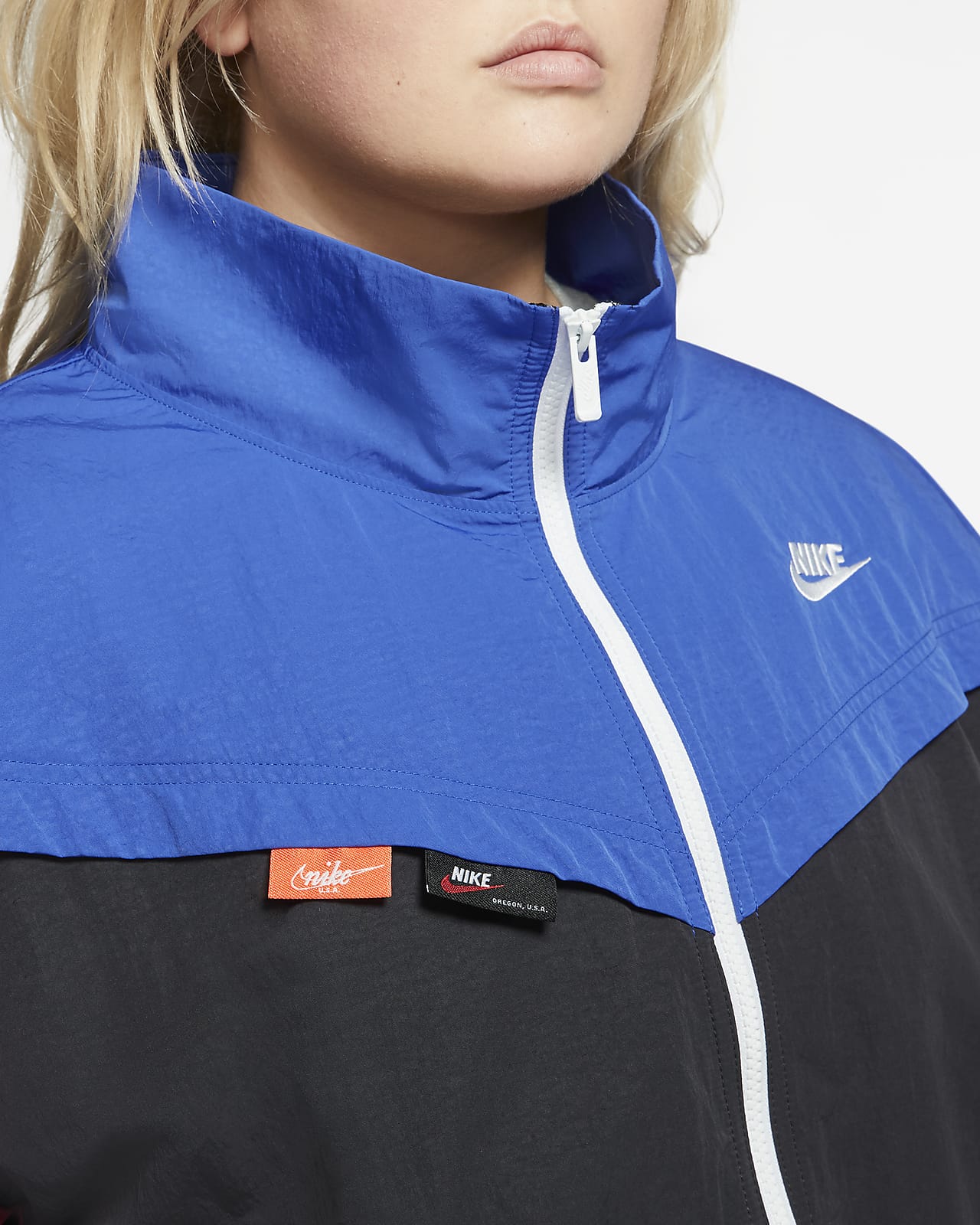 nike woven track top