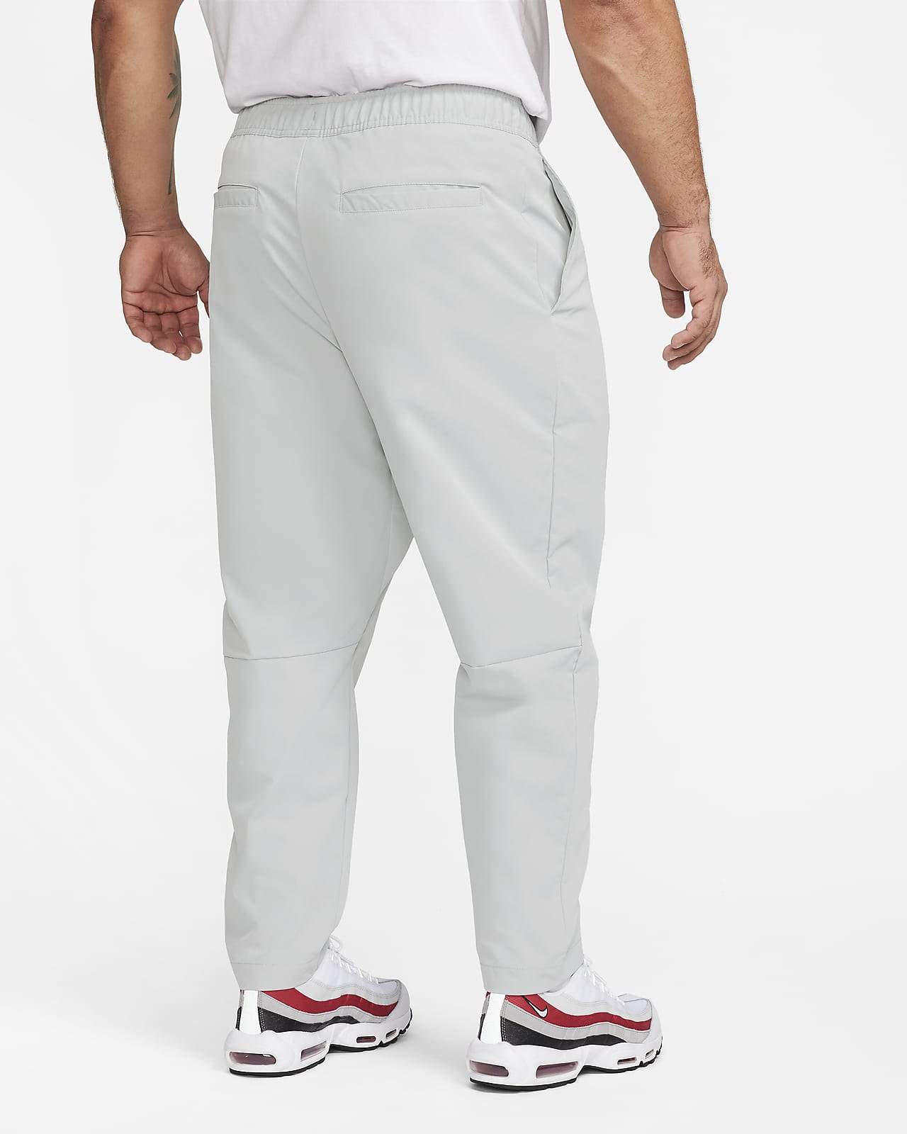 Nike Club Men's Woven Tapered-Leg Trousers. Nike IE