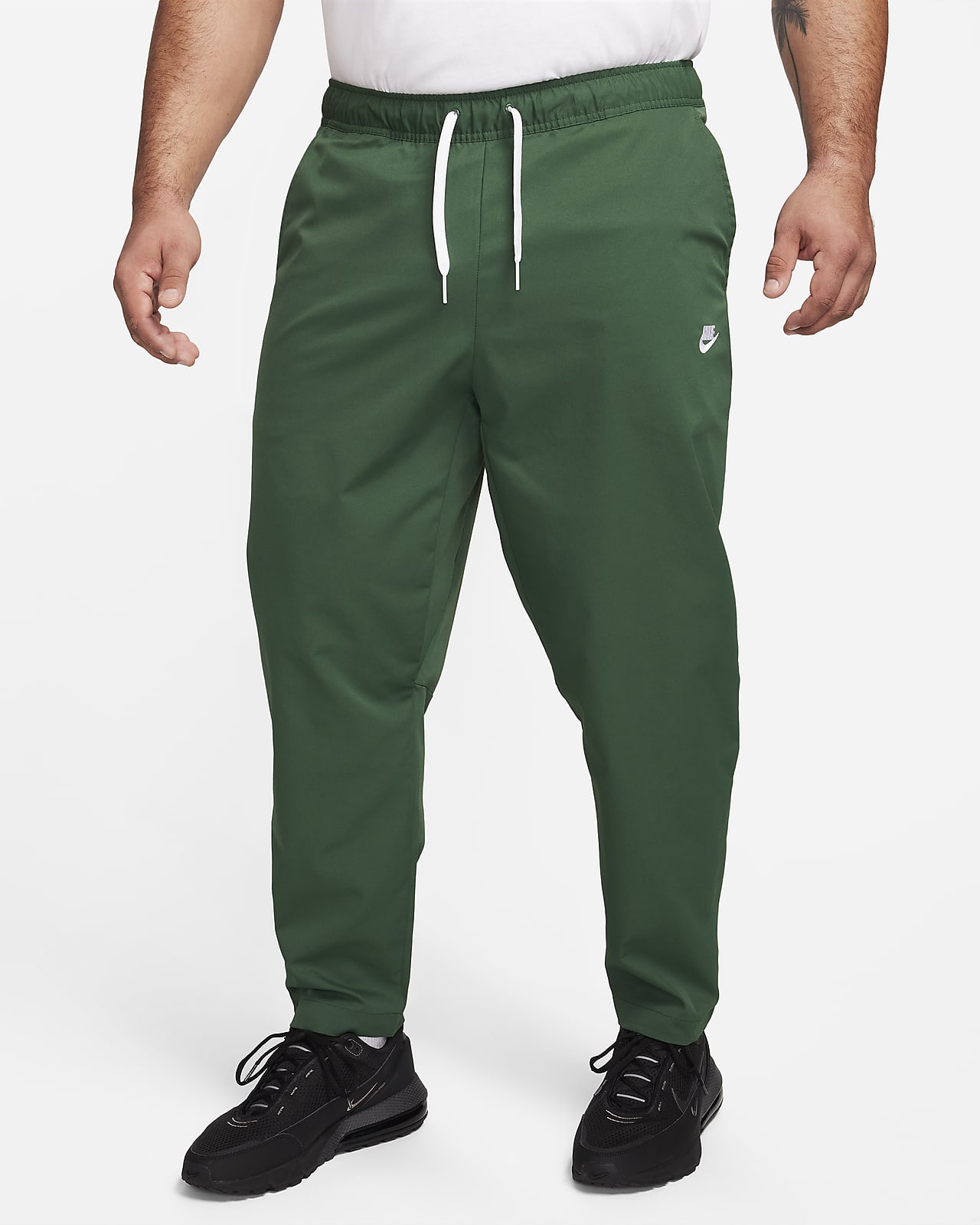 Pants entallados de tejido Woven para hombre Nike Club