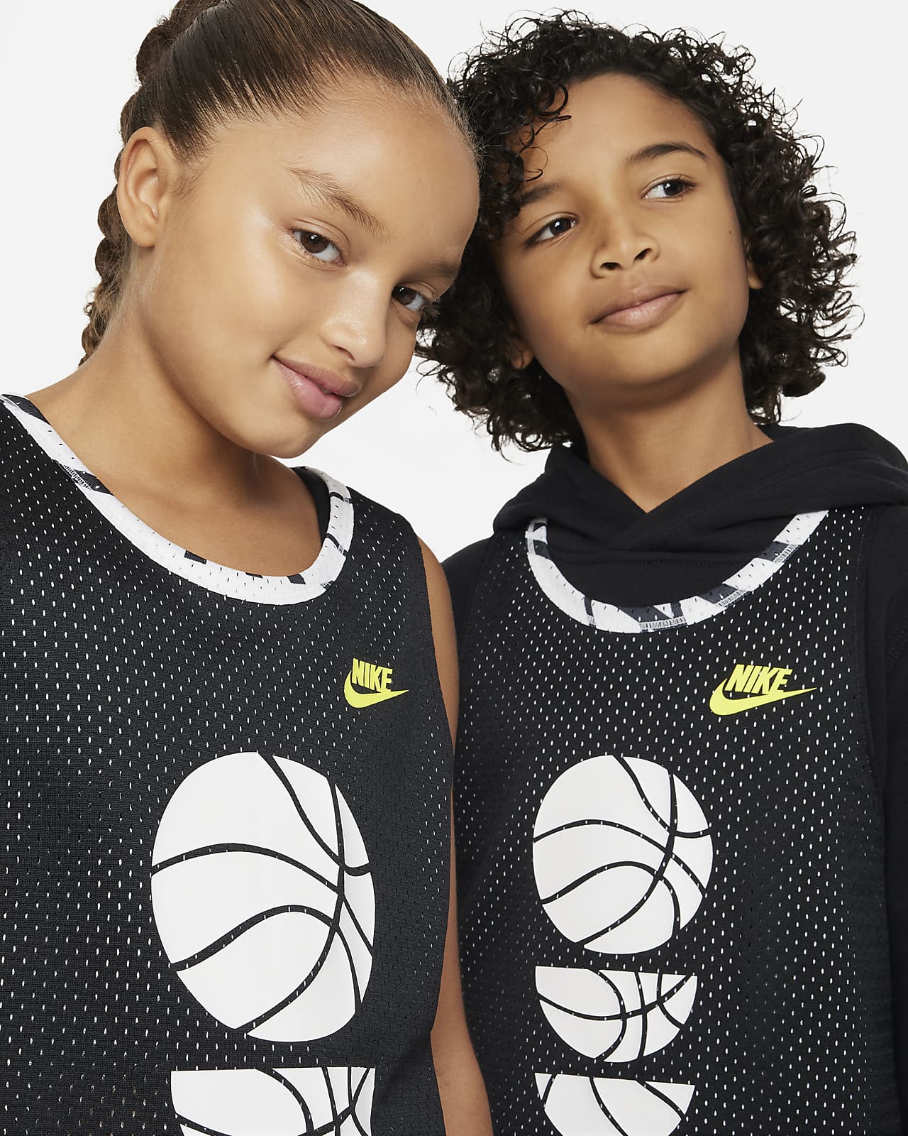 Palmadita niña mando Nike Culture of Basketball Older Kids' Reversible Basketball Jersey. Nike SA
