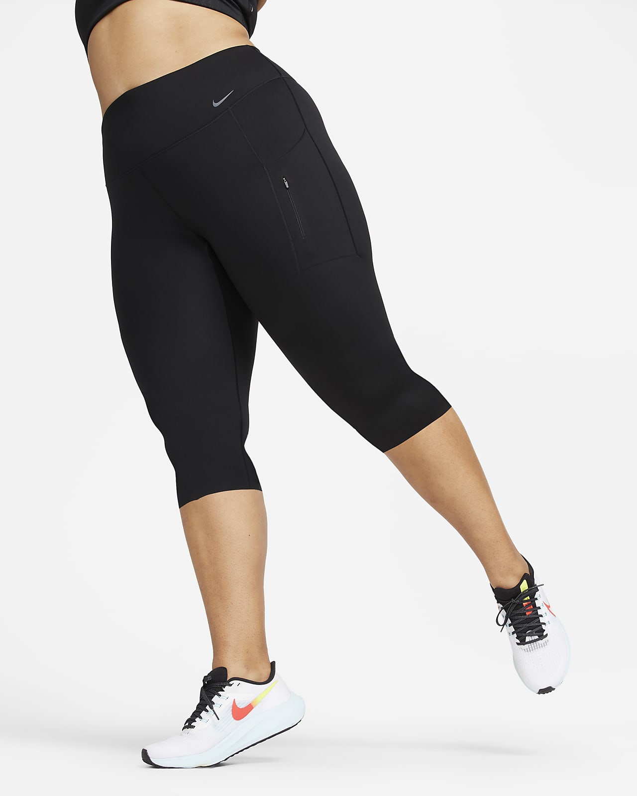 Mallas capri con cintura alta y sujeción firme para mujer Nike Go (talla Nike.com