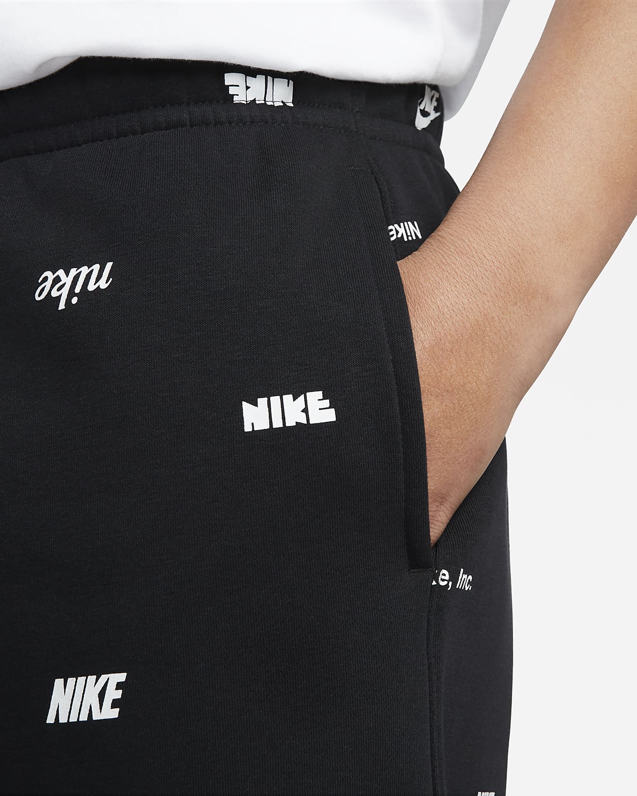 Nike Club Fleece Men's Brushed-Back Graphic Shorts.