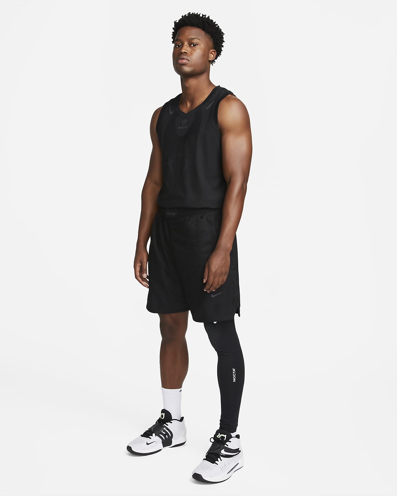 NOCTA Men's Single-Leg Basketball Tights (Left). Nike JP