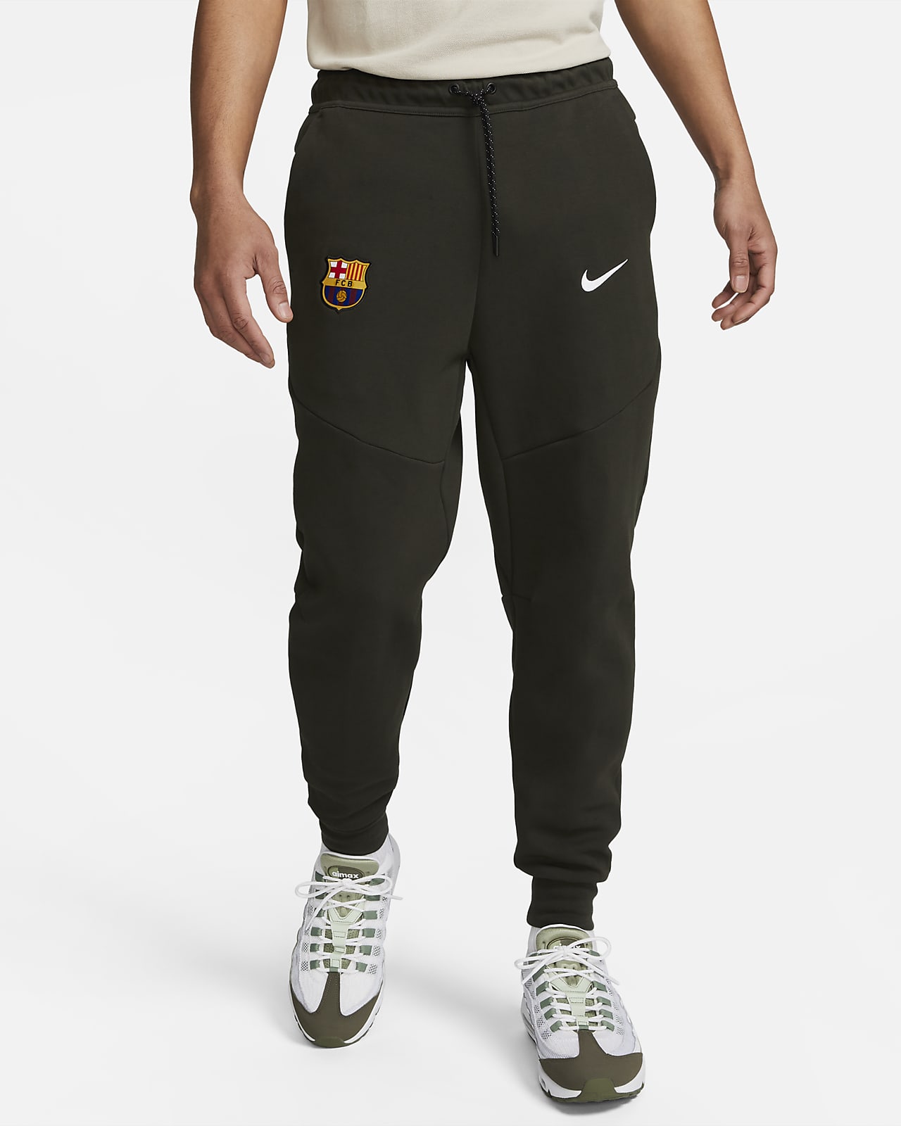 merknaam Delegatie Reactor FC Barcelona Tech Fleece Nike joggingbroek voor heren. Nike BE
