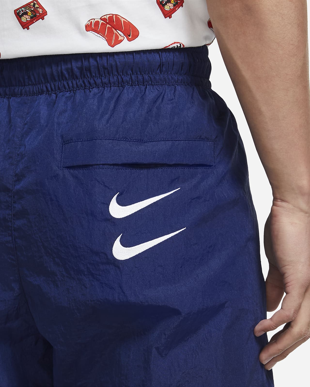 nike swoosh woven trousers