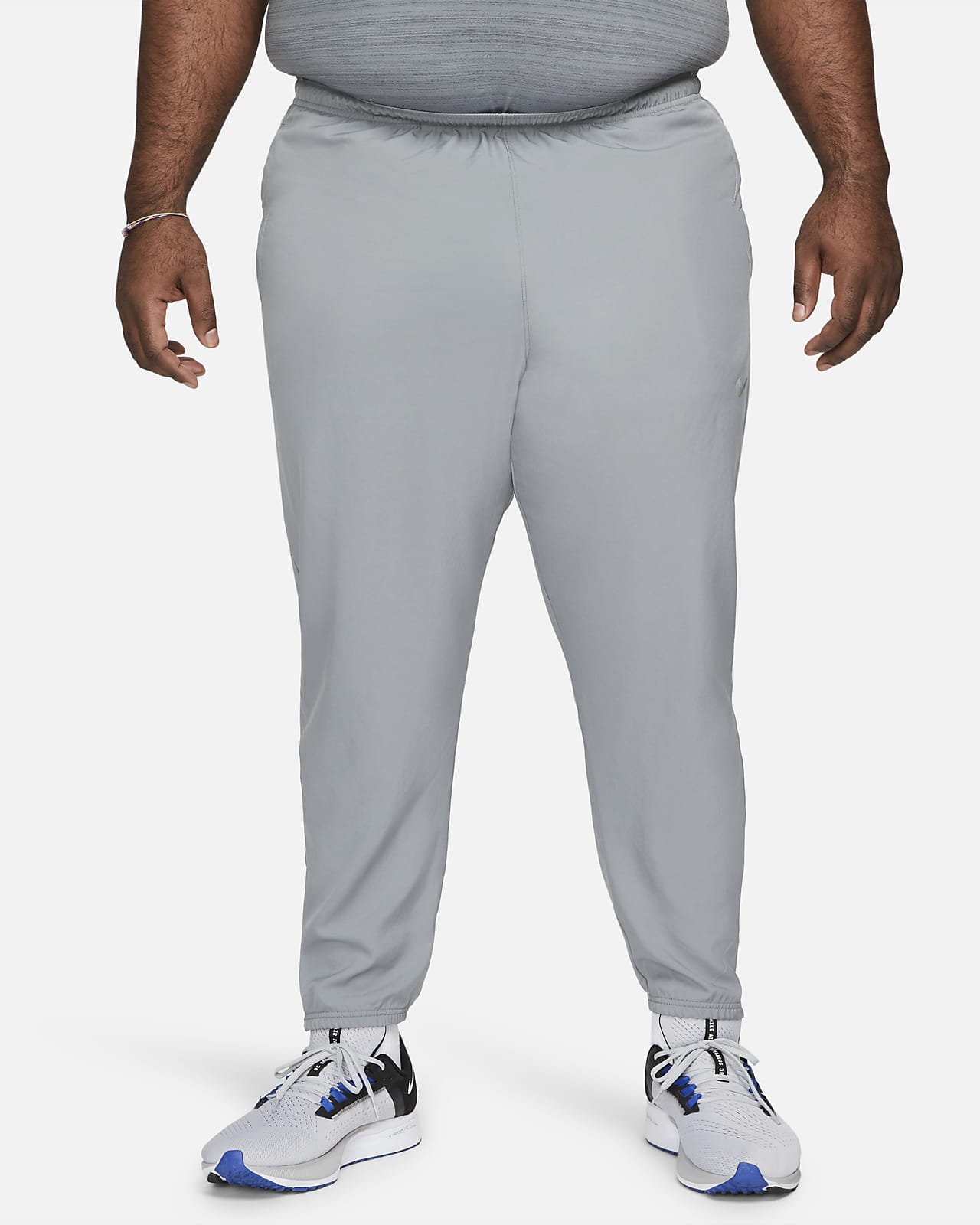 Pantaloni da running in tessuto Nike Dri-FIT Challenger - Uomo. Nike CH