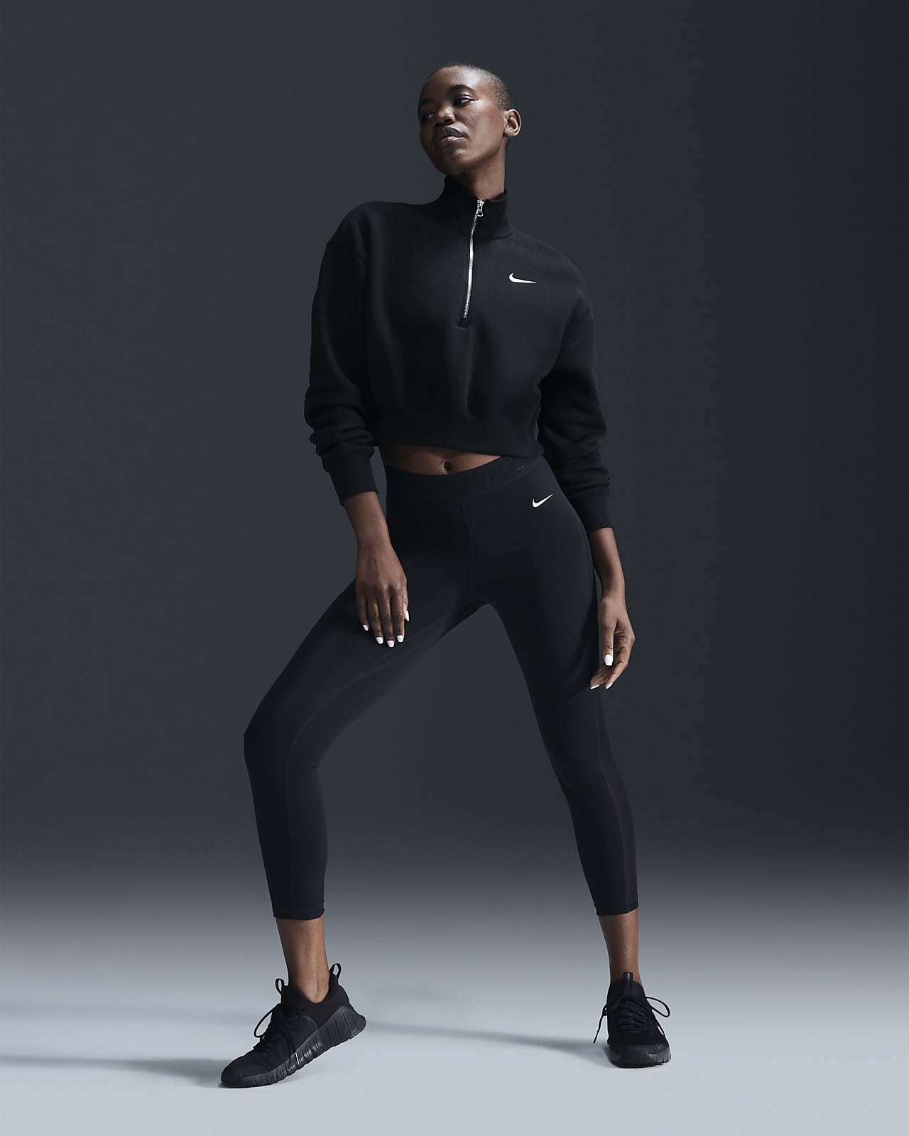 Nike Pro 7/8-Leggings mit mittelhohem Bund und Mesh-Einsatz für Damen