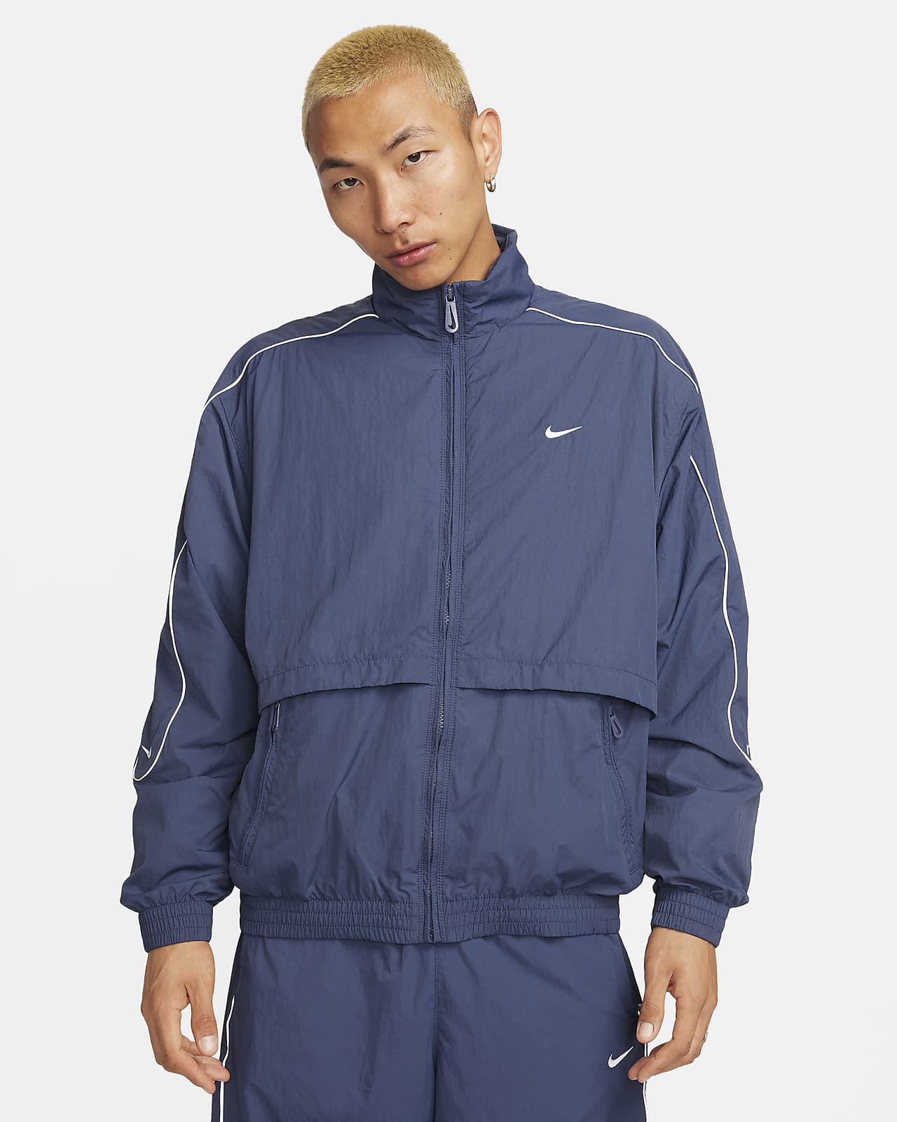 Nike Sportswear Solo Swoosh Men\'s Woven Track Jacket.