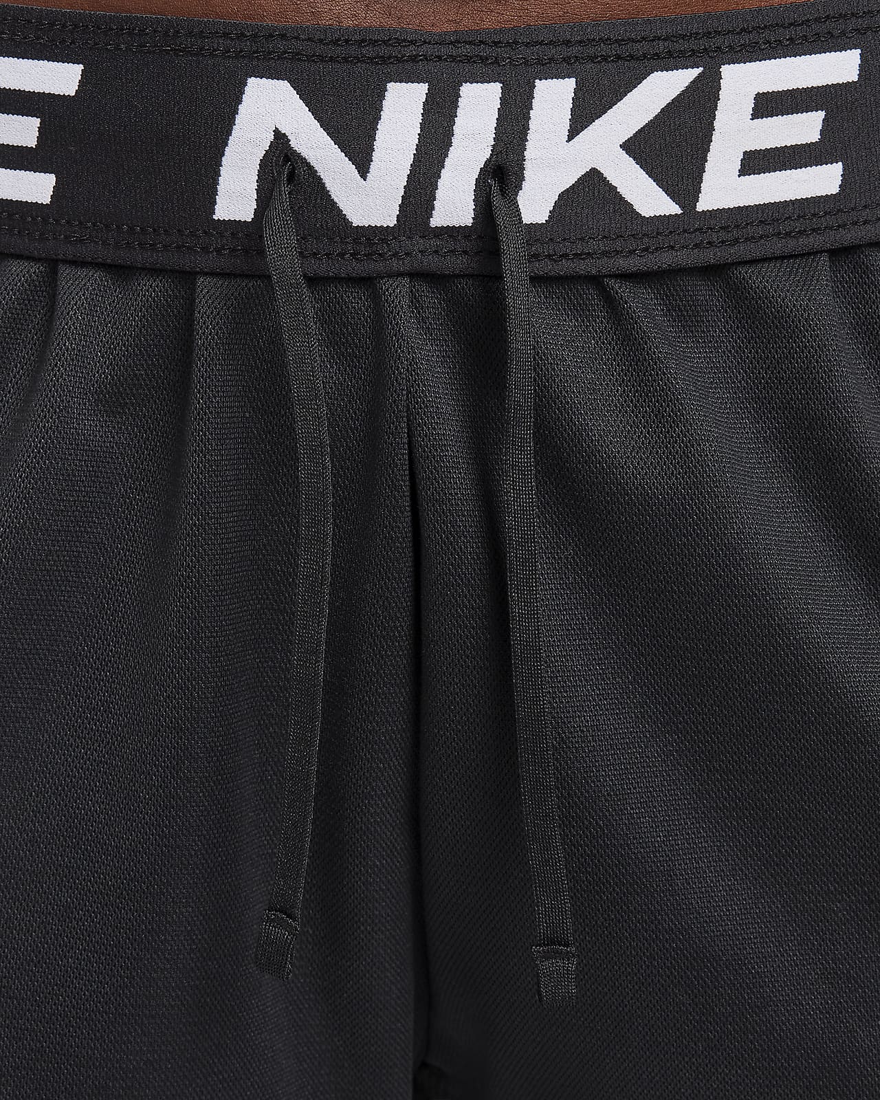 Nike Attack Women's Dri-FIT Fitness Mid-Rise 5 Unlined Shorts.