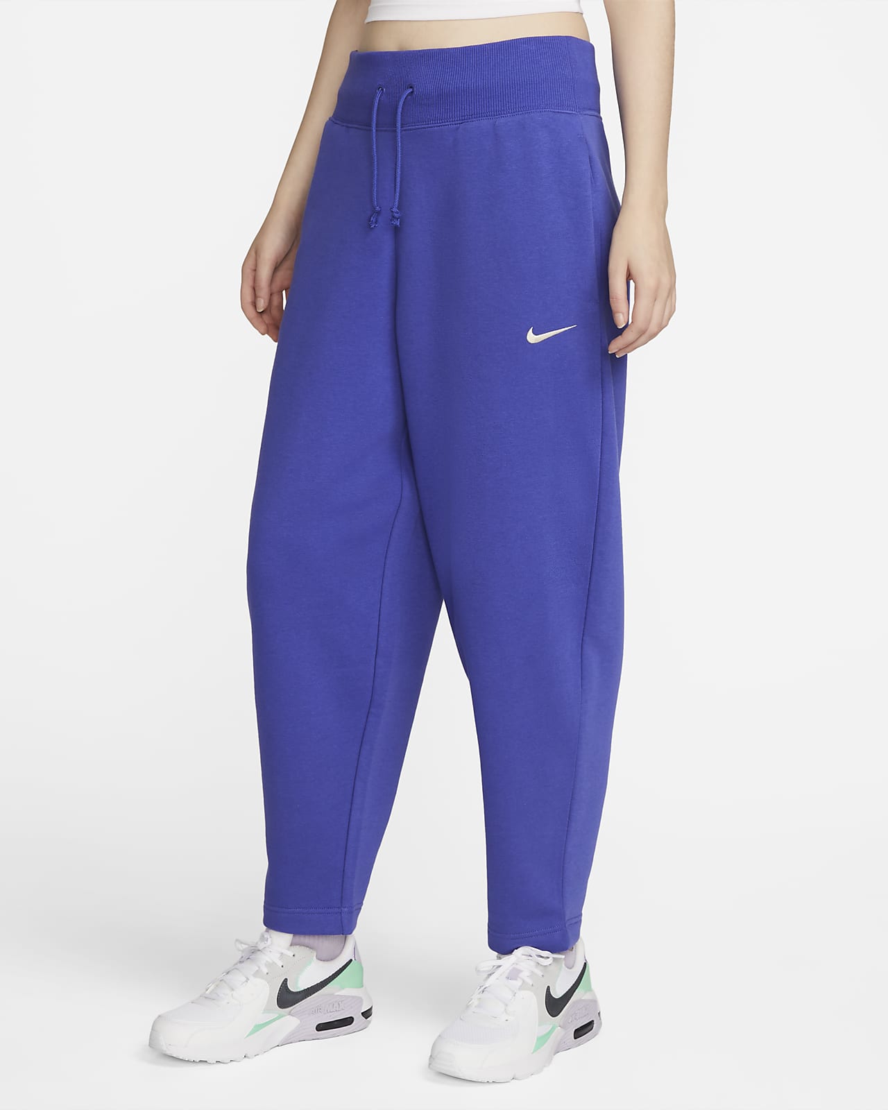 vee Vroegst haai Nike Sportswear Phoenix Fleece 7/8-joggingbroek met hoge taille en  rondingen voor dames. Nike BE