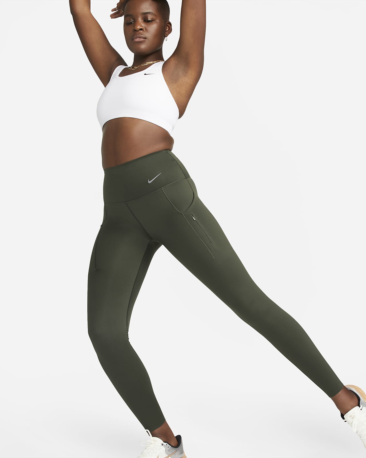 Højtaljede Nike Go-leggings i fuld længde og med lommer og fast støtte til kvinder